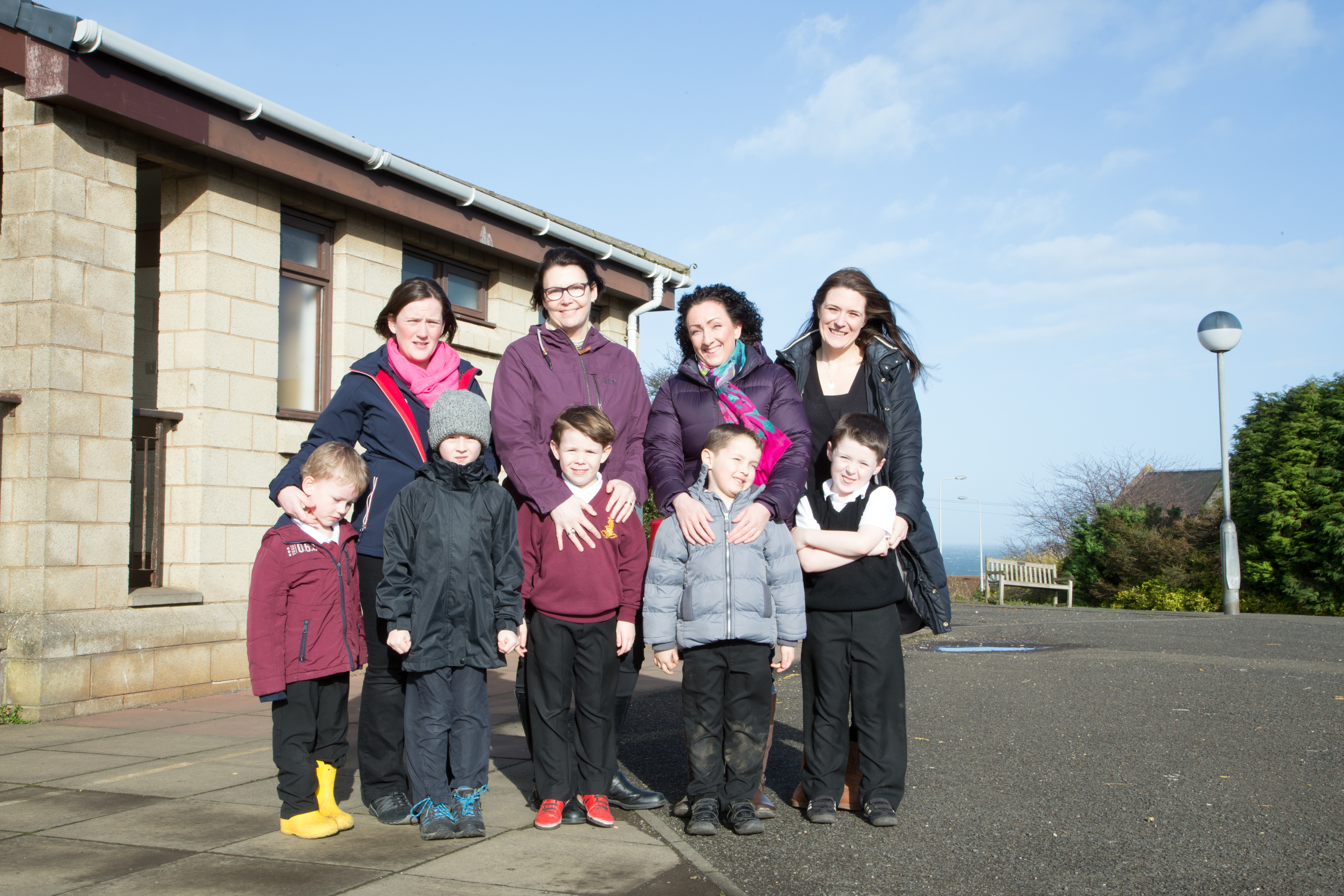 Parents stand in the playground. with their children who attend Kinghorn Primary School. L/R Kate Morgan, Patrick Morgan (6), Carol Taylor, Rennie Taylor (6), Mairi Holden, Oscar Holden (5), Gemma Taylor, Bailey Taylor (5) Oliver Taylor (8)