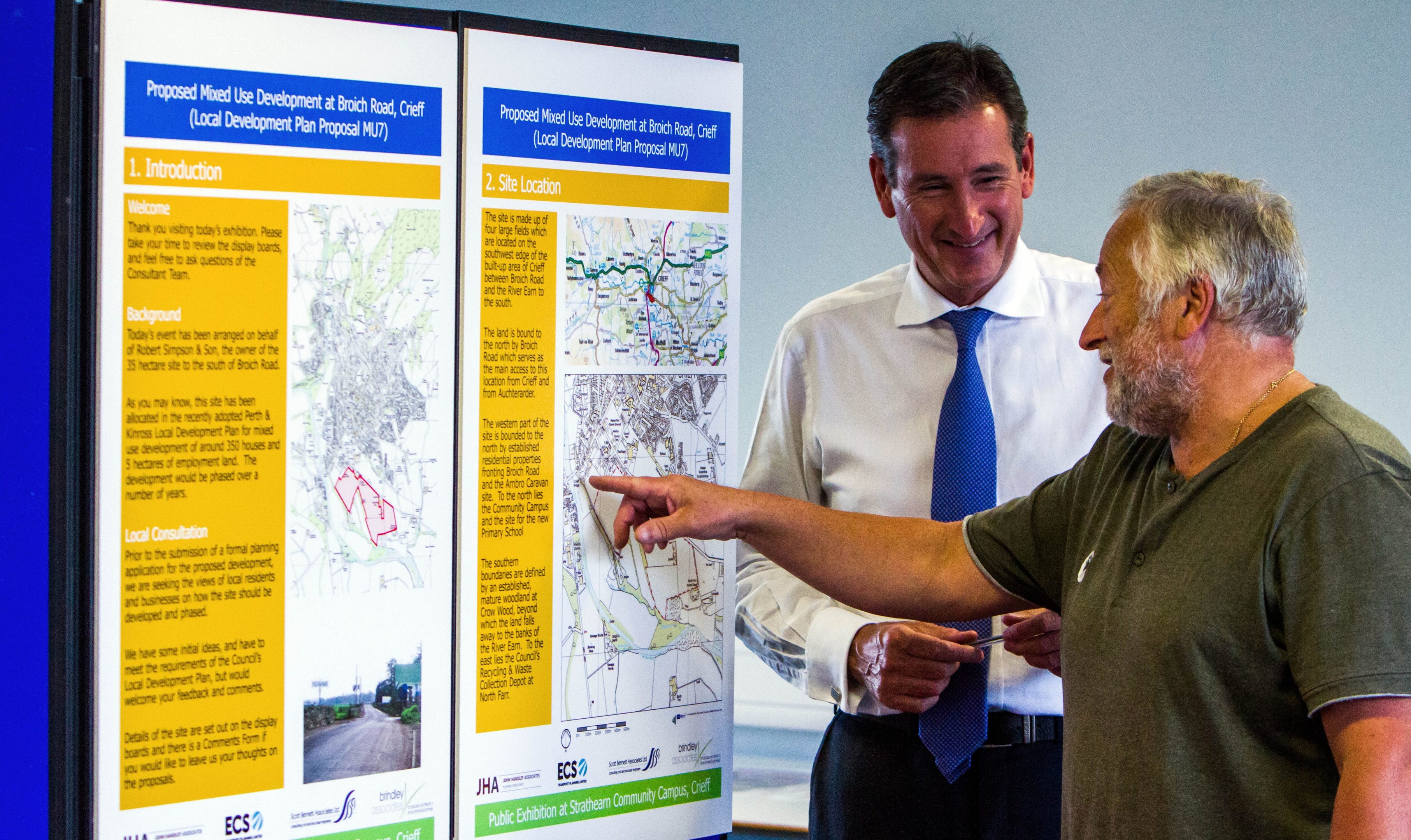 Public exhibition on proposals for the Broich Road development at Crieff. Pictured, Kim Marshall (right, from Crieff) chats to Alston Birnie (left, planning consultant for landowner Robert Simpson and Sons Ltd).