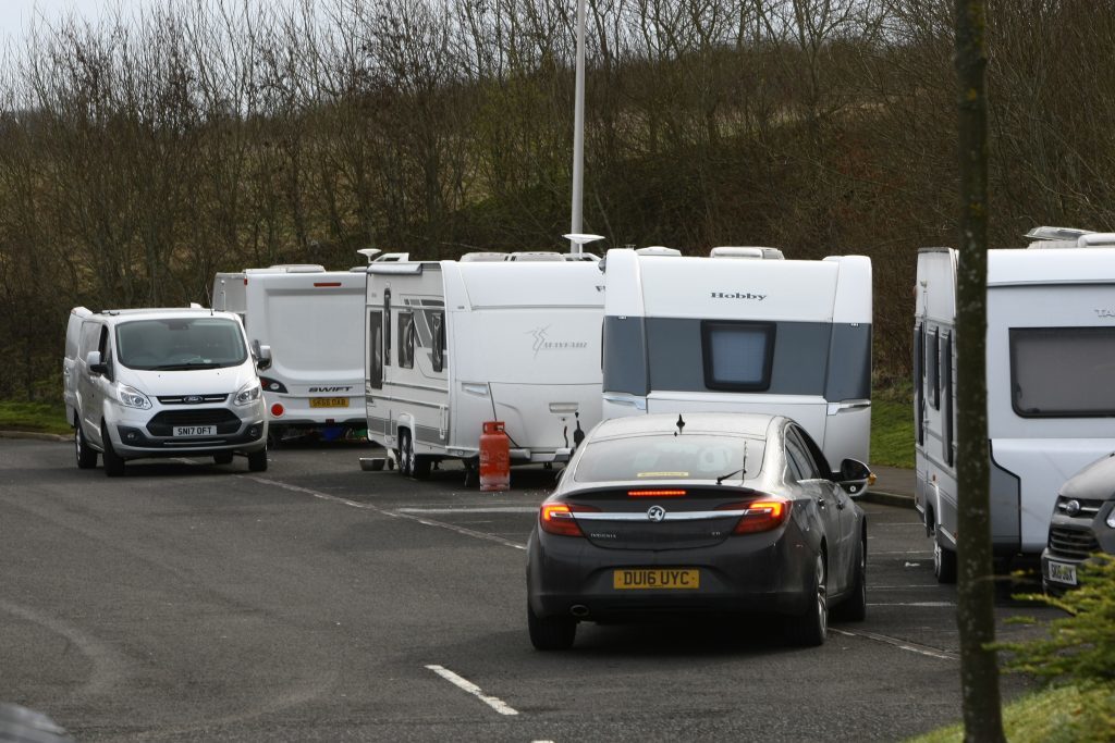 The caravans parked across dozens of spaces at Broxden park and Ride.