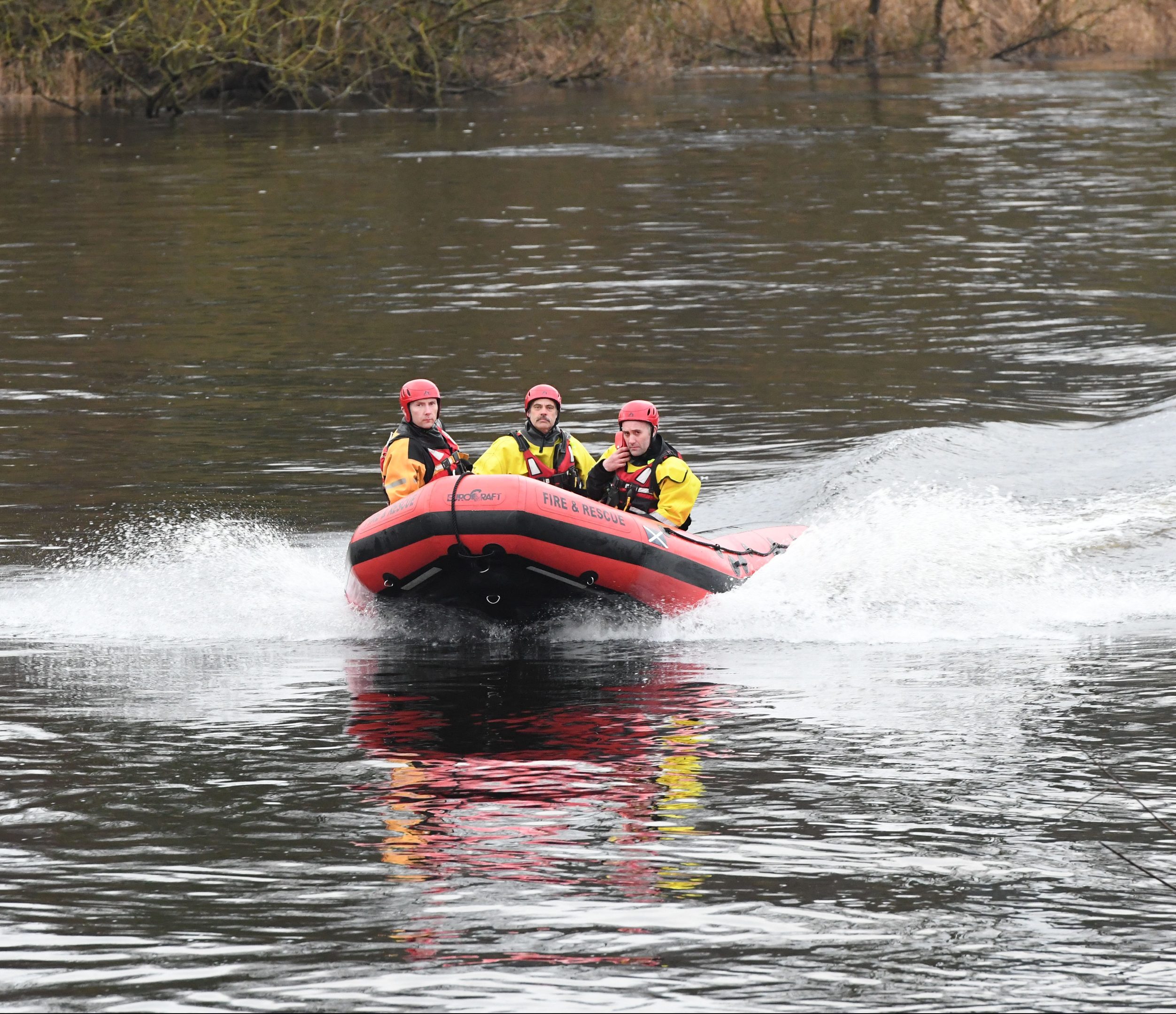 Firefighters search the River Tay, Perth, on Saturday.