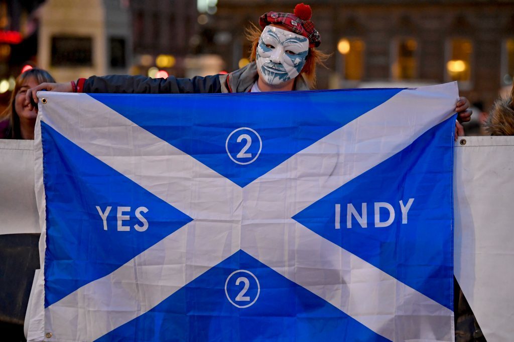 Independence supporters gather in George Square, Glasgow, following Monday's announcement about IndyRef2