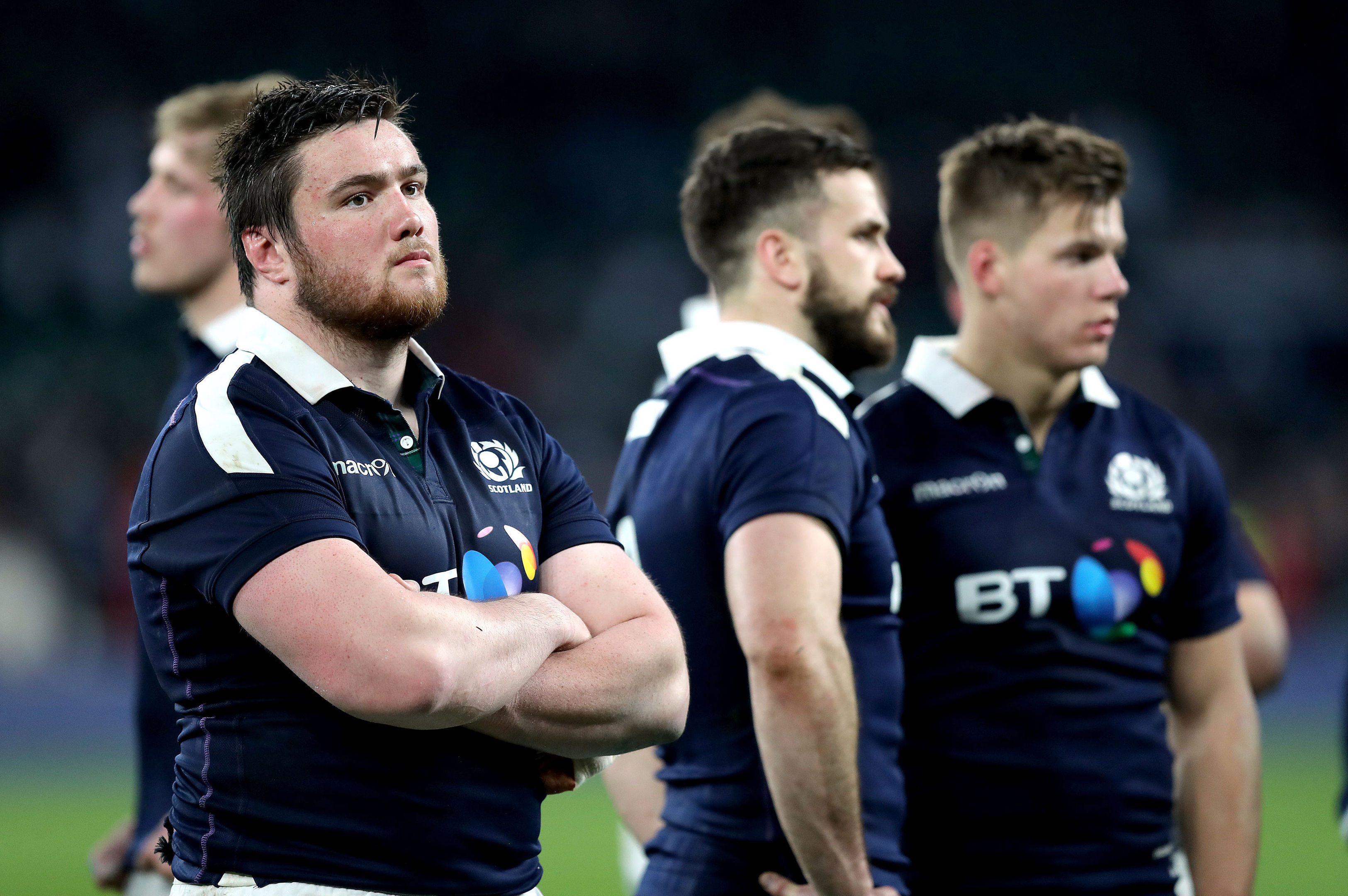 Dejected Scotland players Zander Fagerson, Alex Dunbar and Huw Jones after the loss to England.