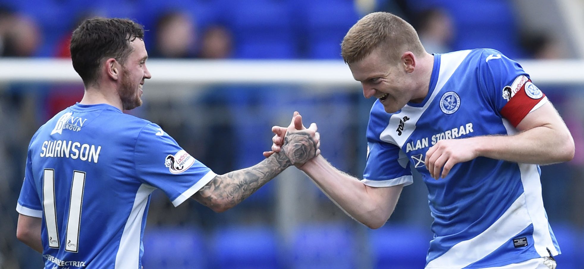 Delight for Saints Danny Swanson, left, and Brian Easton at the final whistle.