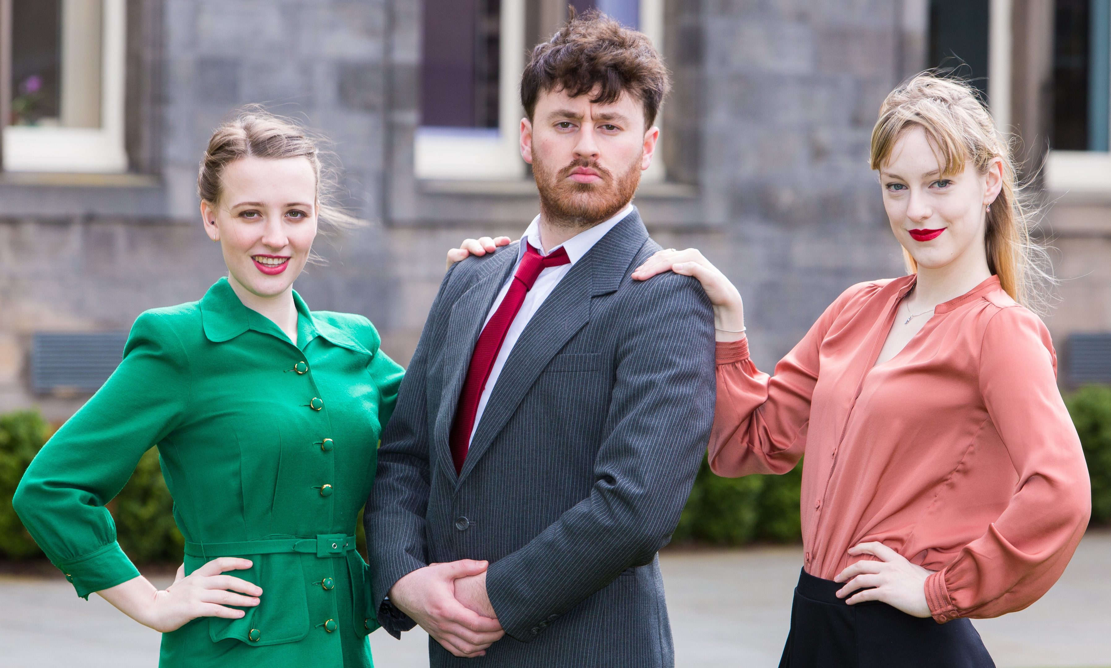 Super Rich Connor Powell  with his assistants Mille Postle, left, and Elizabeth Beattie, right, get ready to perform Urinetown at the On The Rocks Festival in St Andrews.