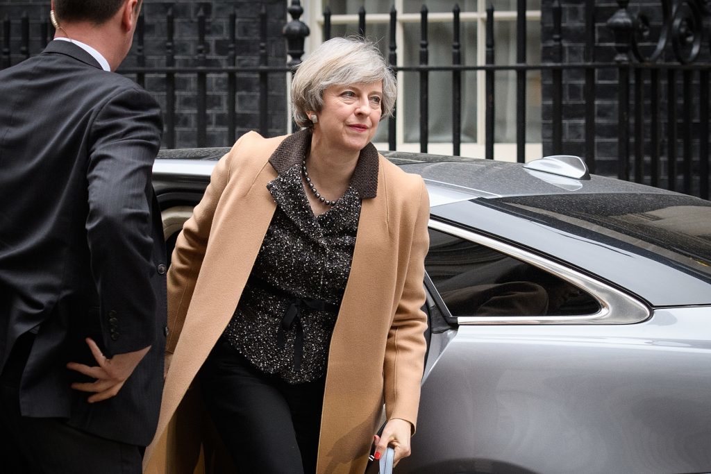 British Prime Minister Theresa May returns to number 10, Downing Street, after delivering a statement on the EU Council meeting, to the House of Commons on March 14, 