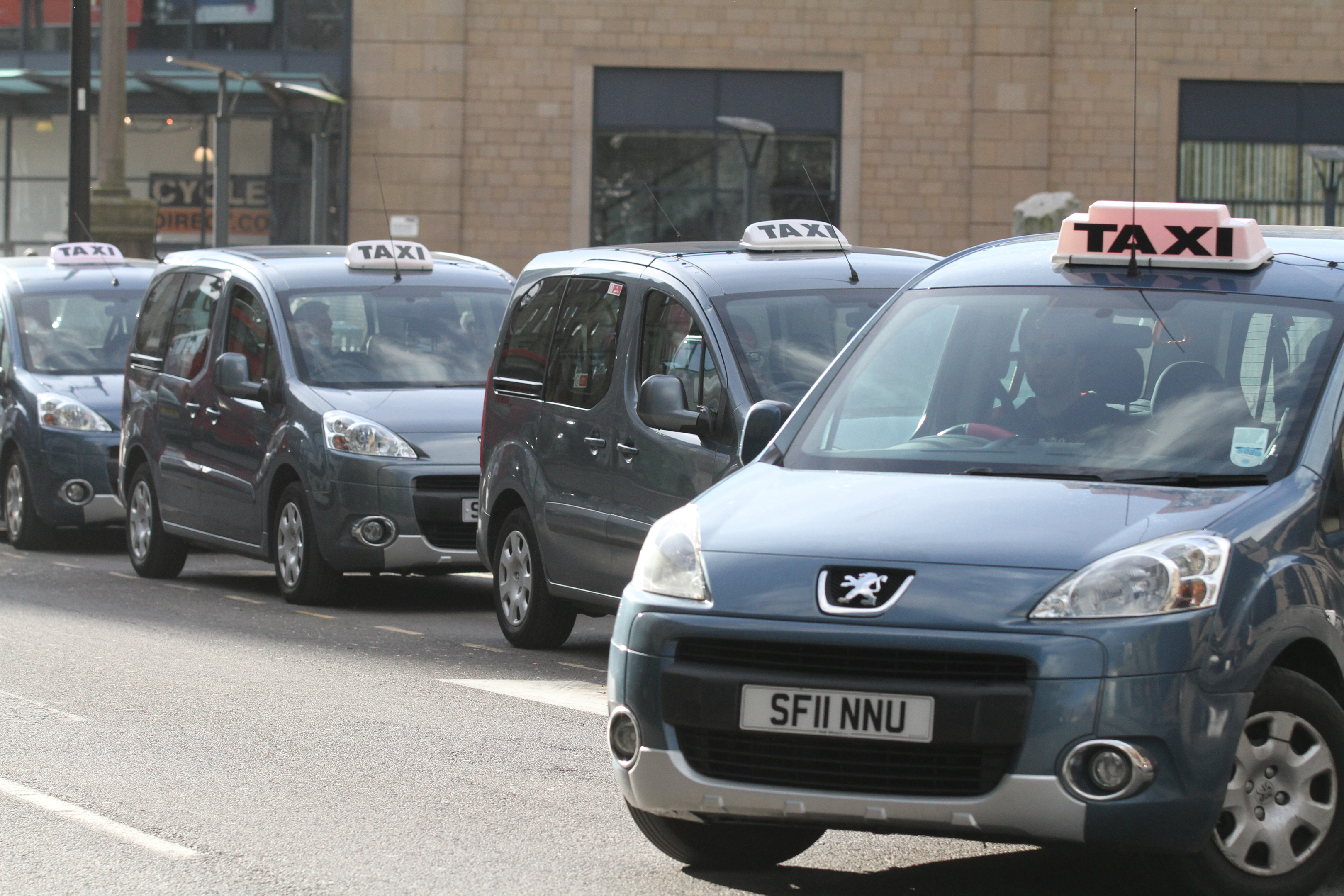 A taxi, similar to the ones pictured, was said to have been attacked on Friday night.