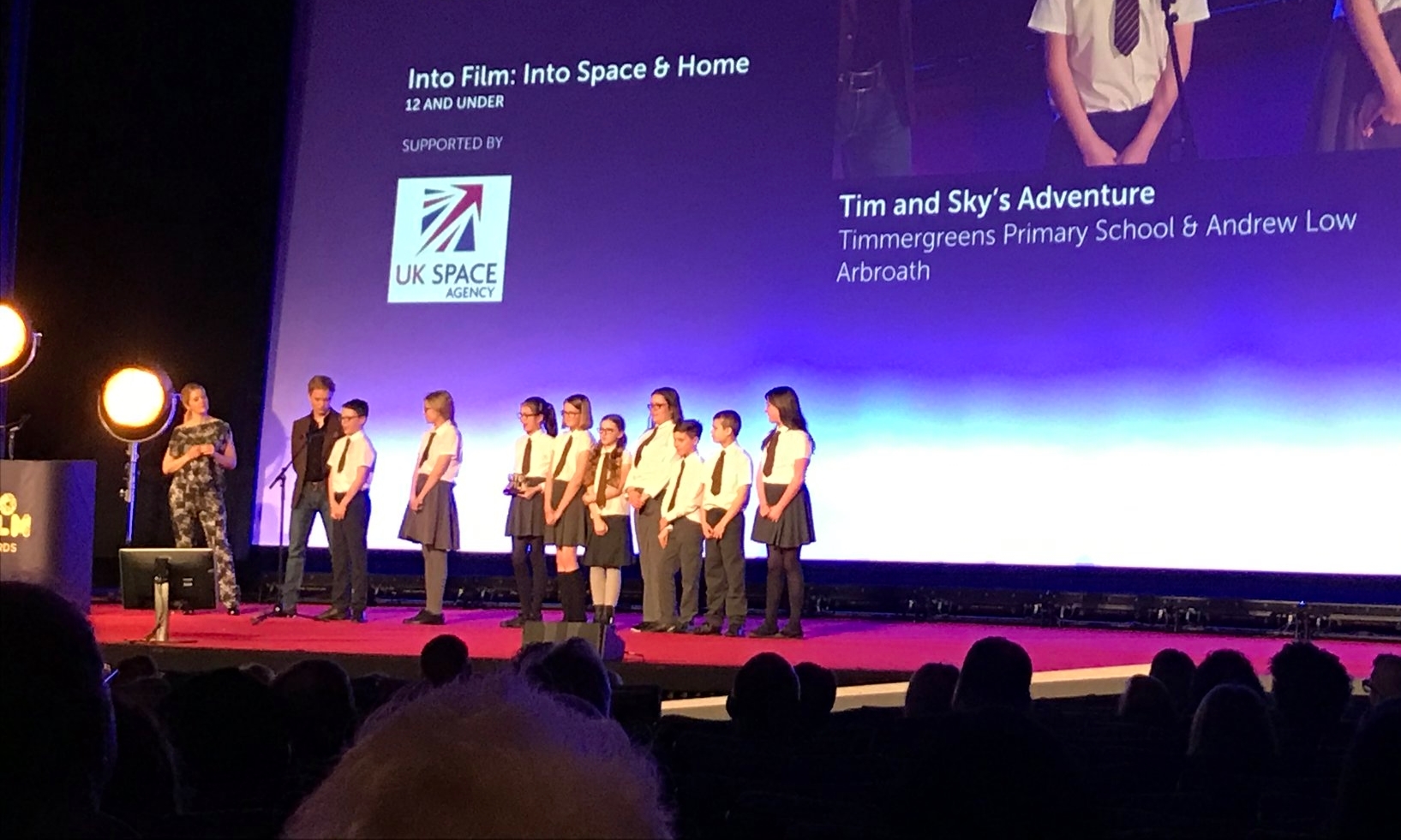 The pupils take to the stage at the Get Into Films awards in London.