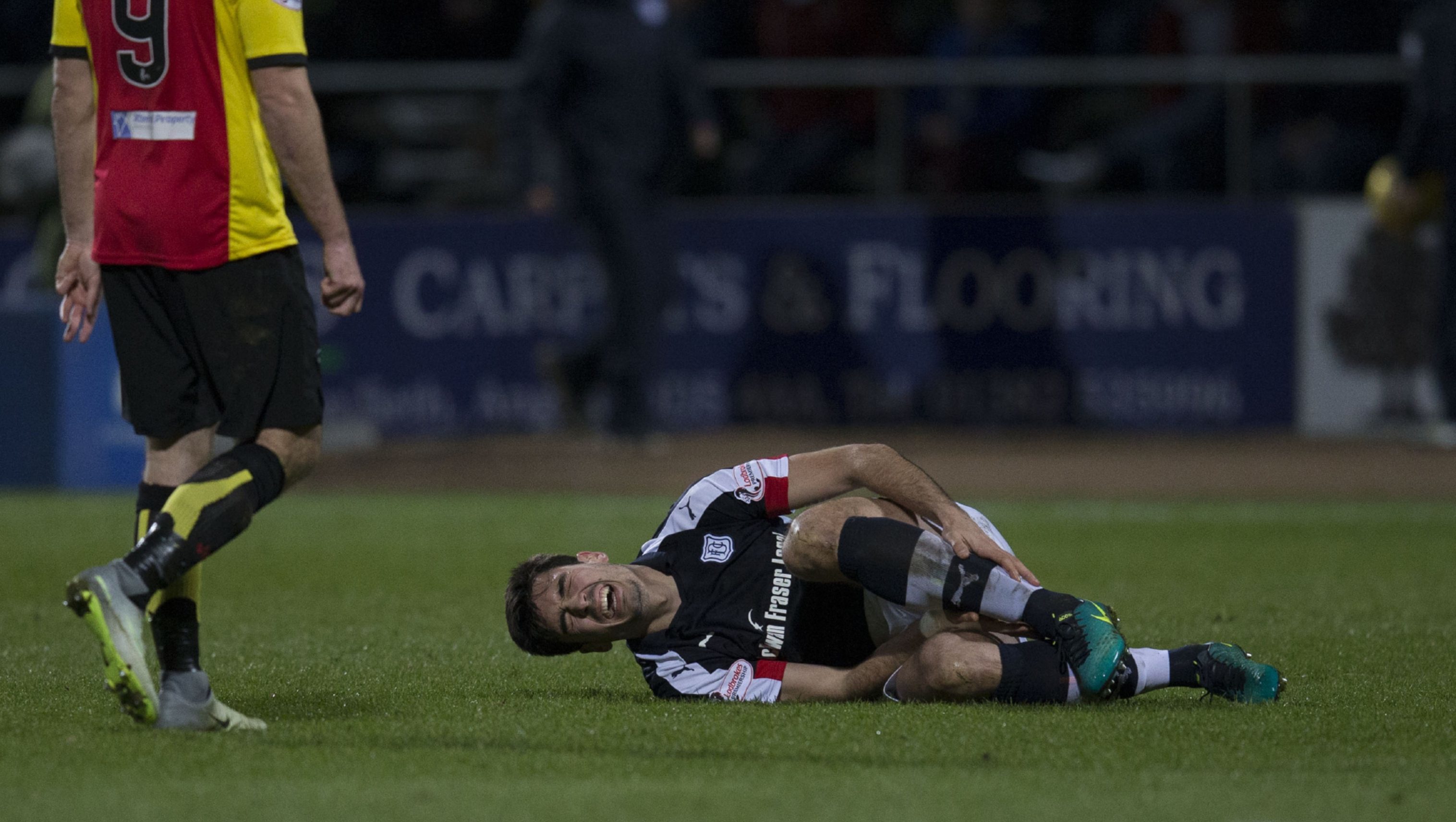 Julen Etxabeguren goes to ground after suffering injury.