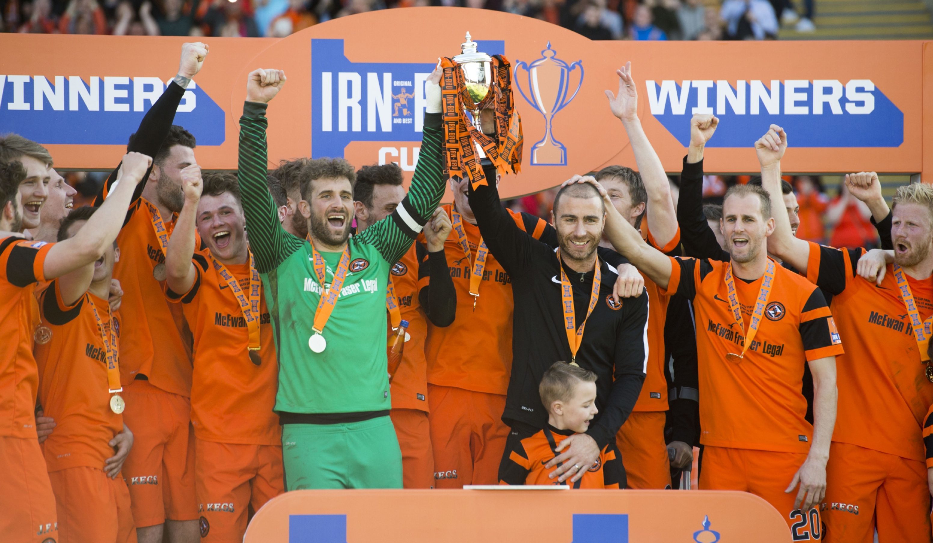 The United players celebrate their cup win.