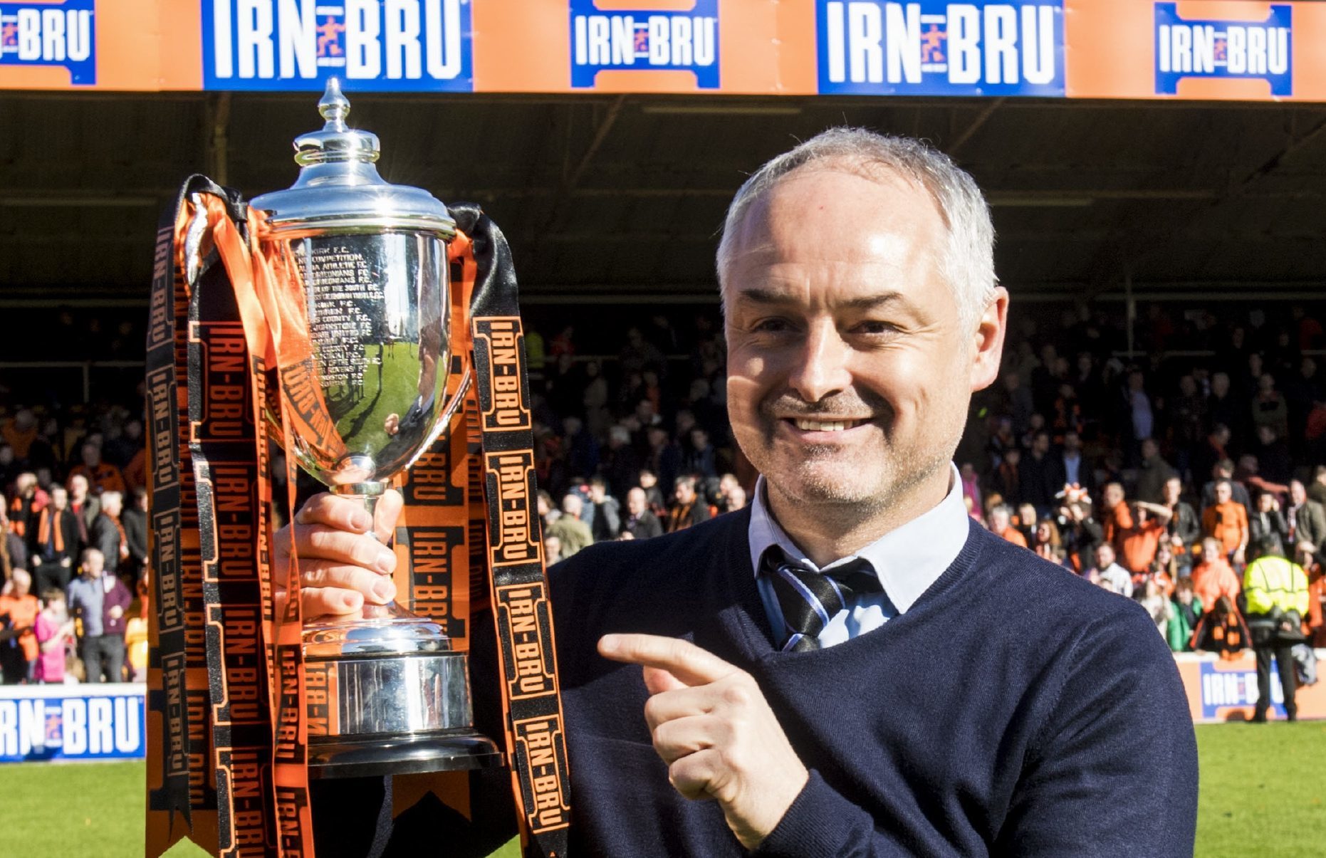 United boss Ray McKinnon with the cup.