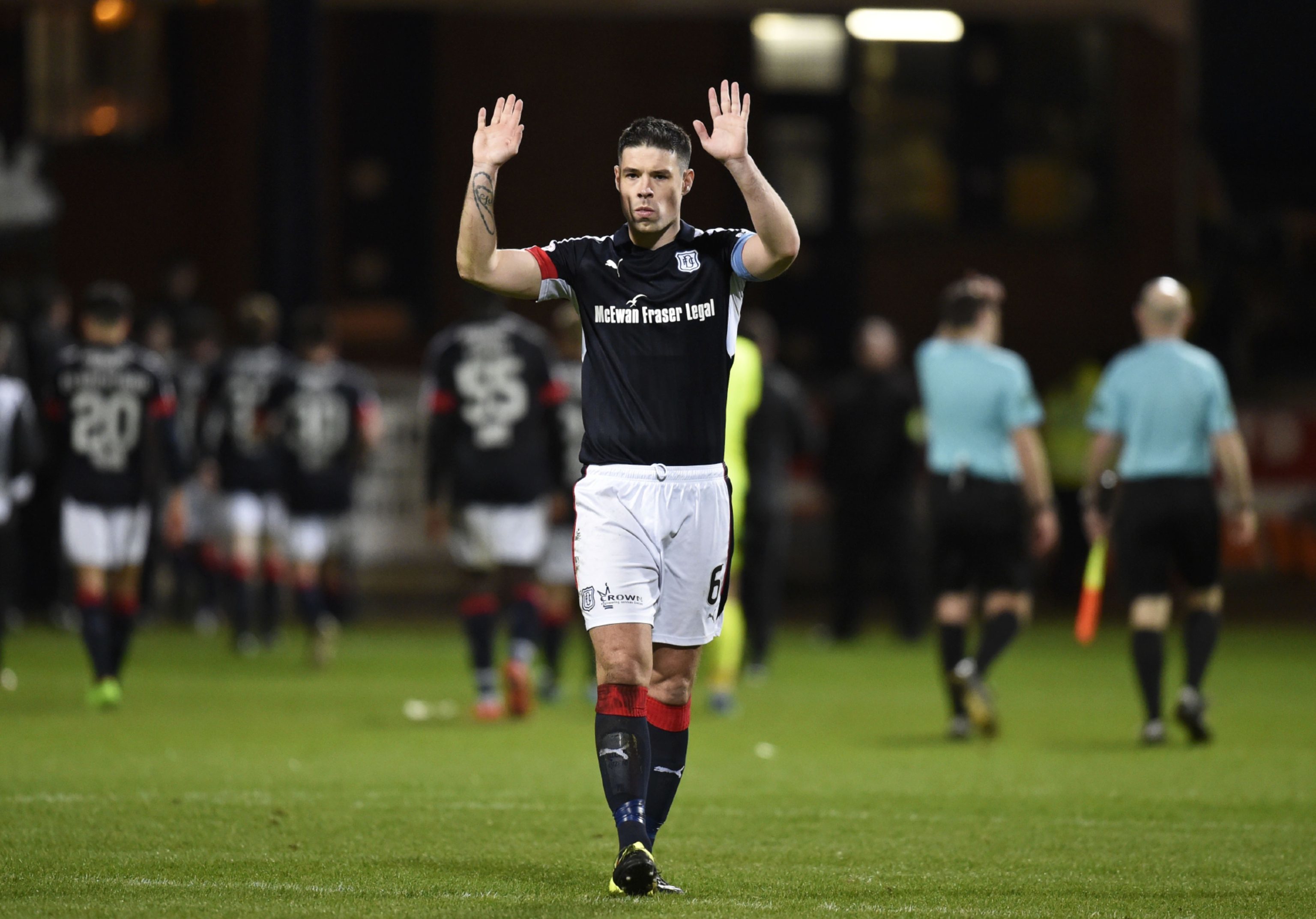 Darren O'Dea holds his hands up at the end of the game.