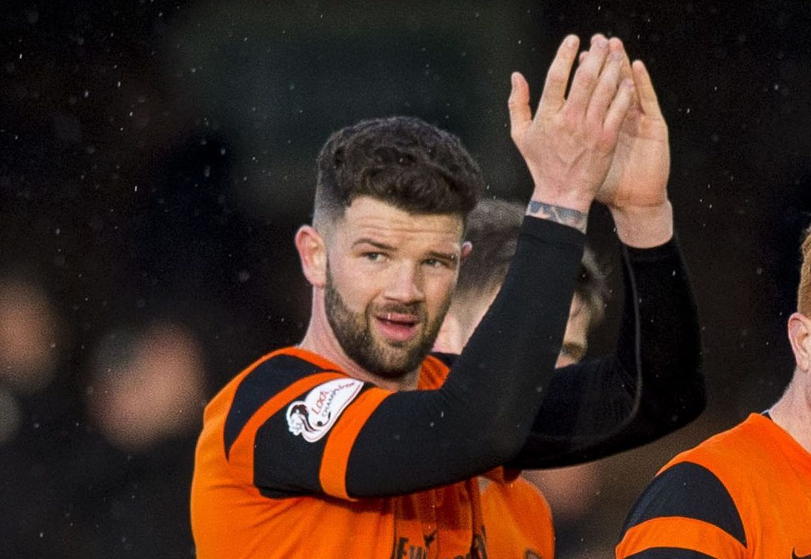 Dundee United's Mark Durnan and Simon Murray at full-time.