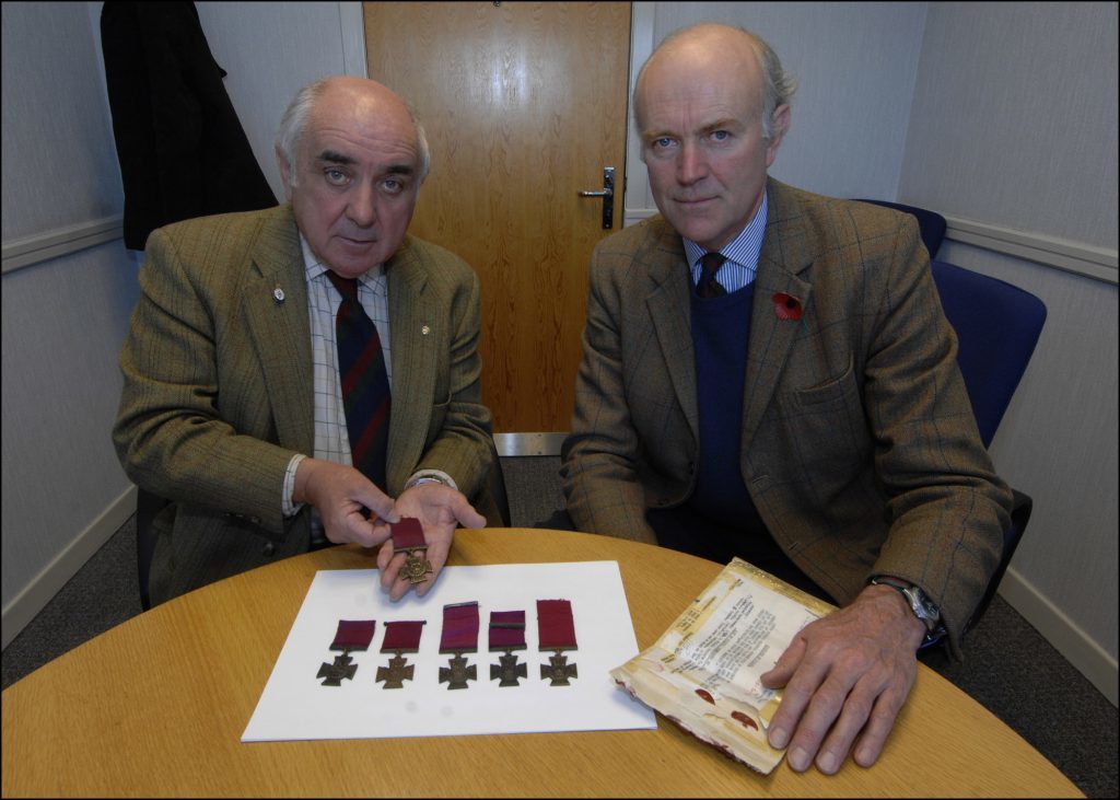 Major Ronnie Proctor and Lieutenant Colonel Roddy Riddell from the Black Watch Museum, Balhousie Castle Perth with Black Watch Victoria Crosses. Mjr Proctor holding the VC won by Pte Melvin. Any inquires please ring Major Ronnie Proctor on 0131 310 8530.