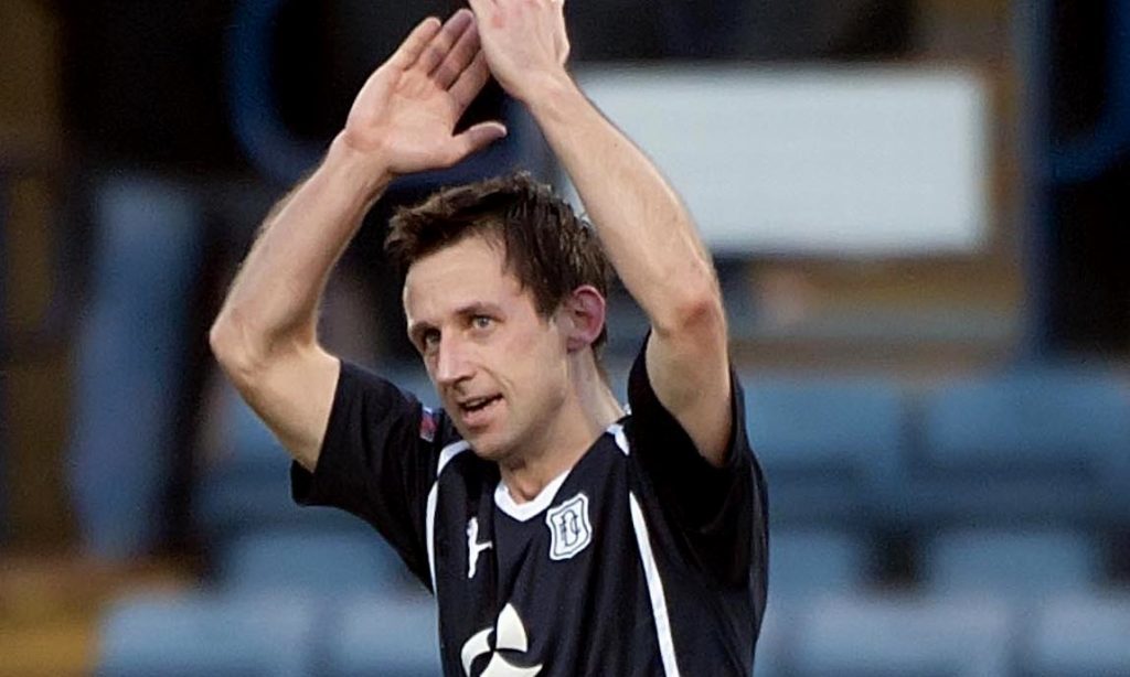 Neil McCann celebrates after scoring the winning goal for Dundee aganst Raith Rovers in 2011.