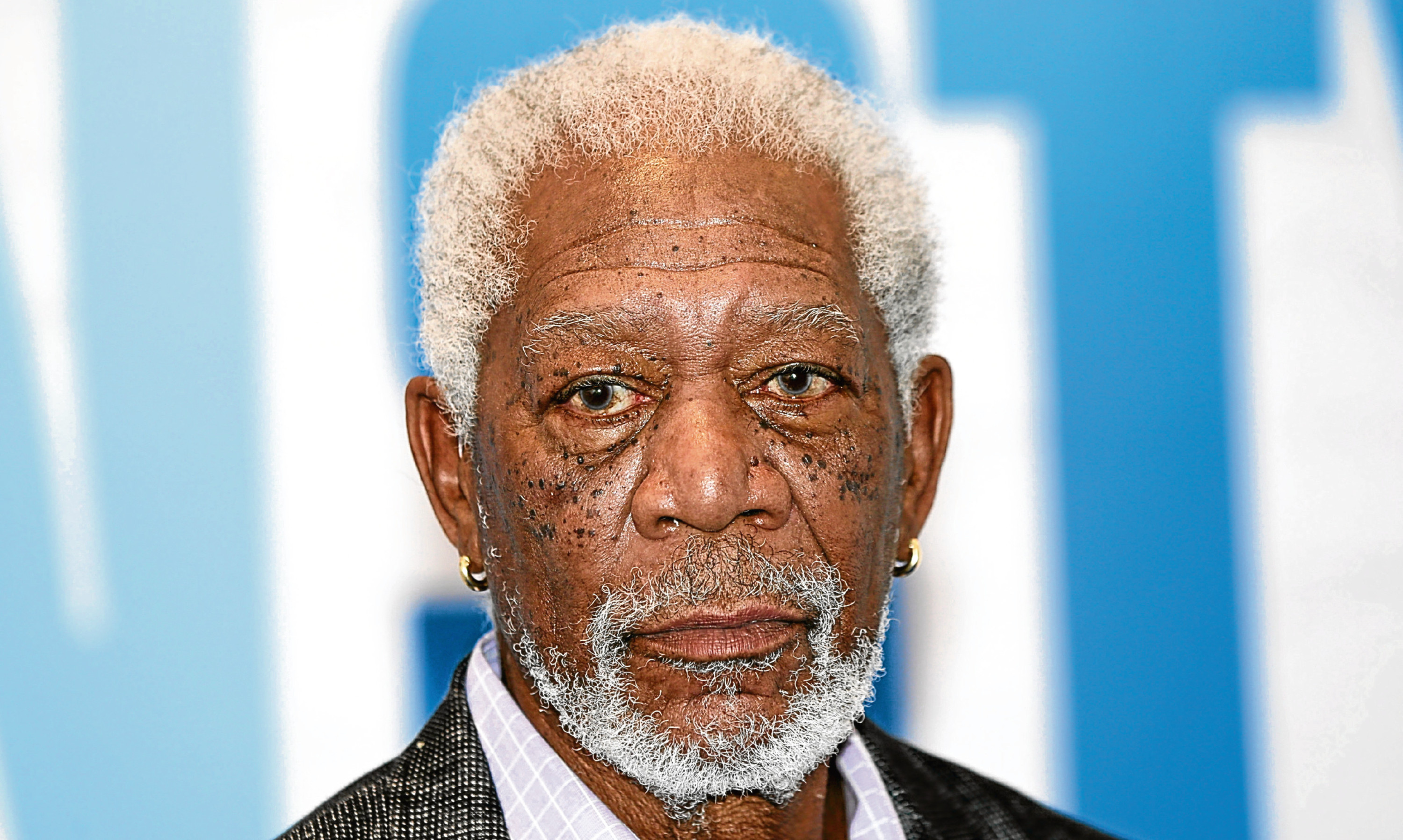 Morgan Freeman - who won't do your voicemails any more.