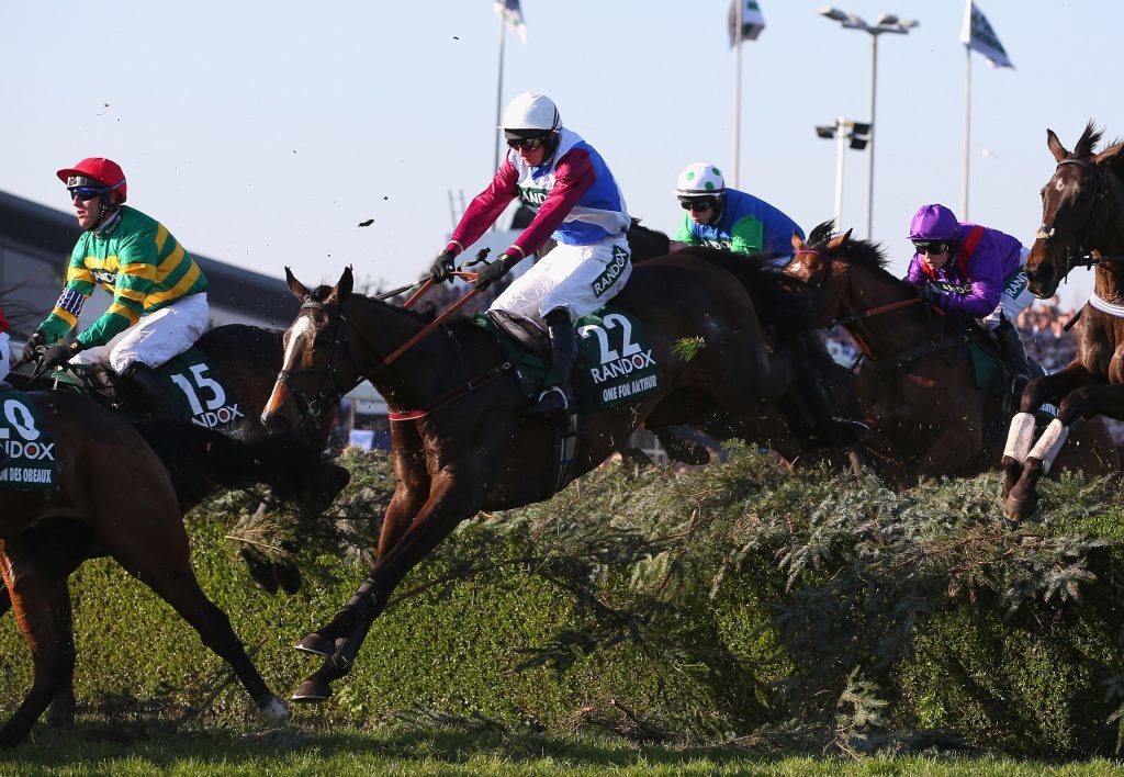 One For Arthur ridden by Derek Fox clears the Water Jump on their way to victory in the 2017 Randox Health Grand National.