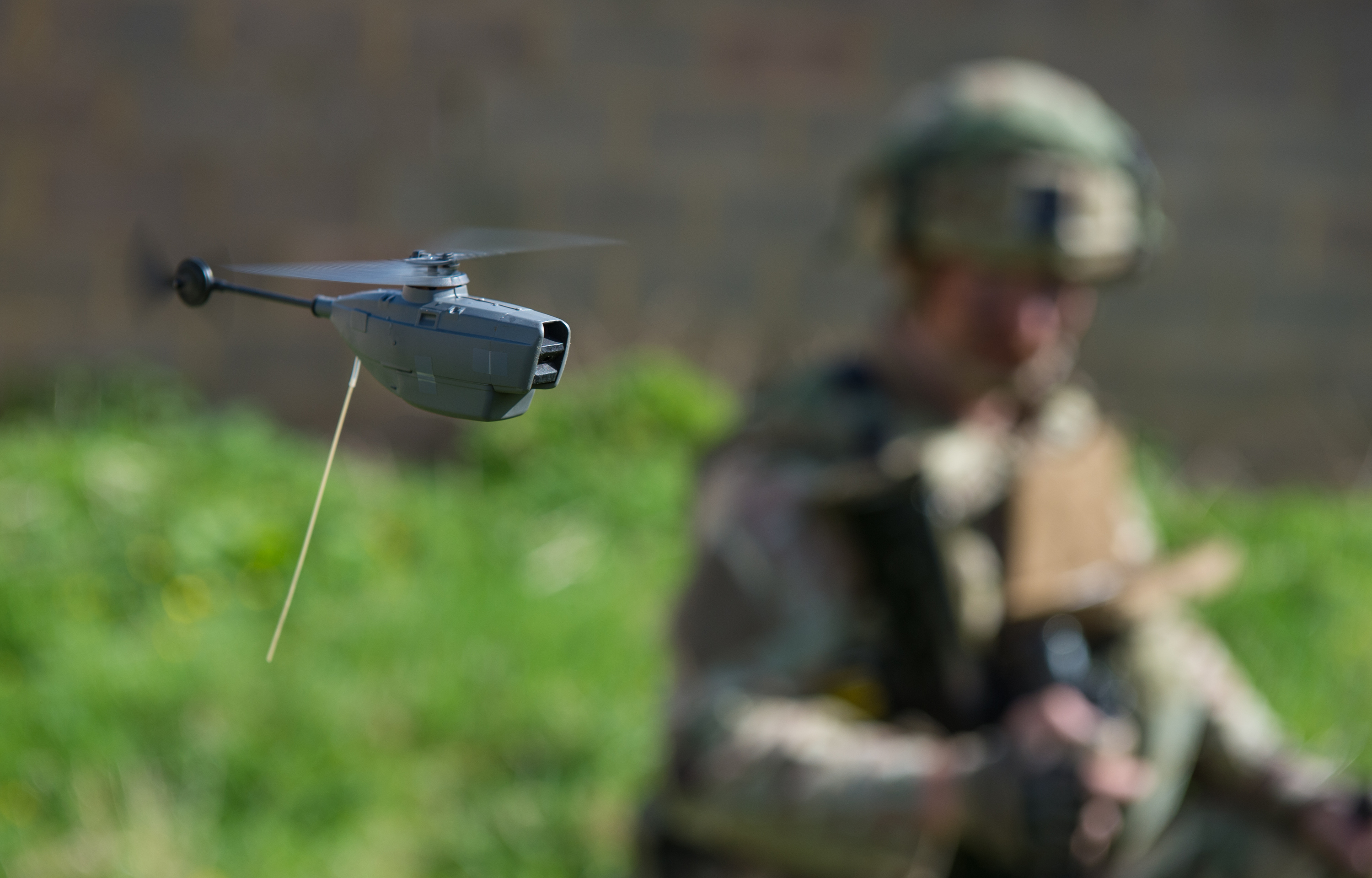 Royal Marine flies a Black Hornet 2 Unmanned Air System.