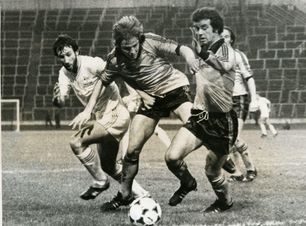 Frank Kopel, right, in action in 1979 during his time with United.