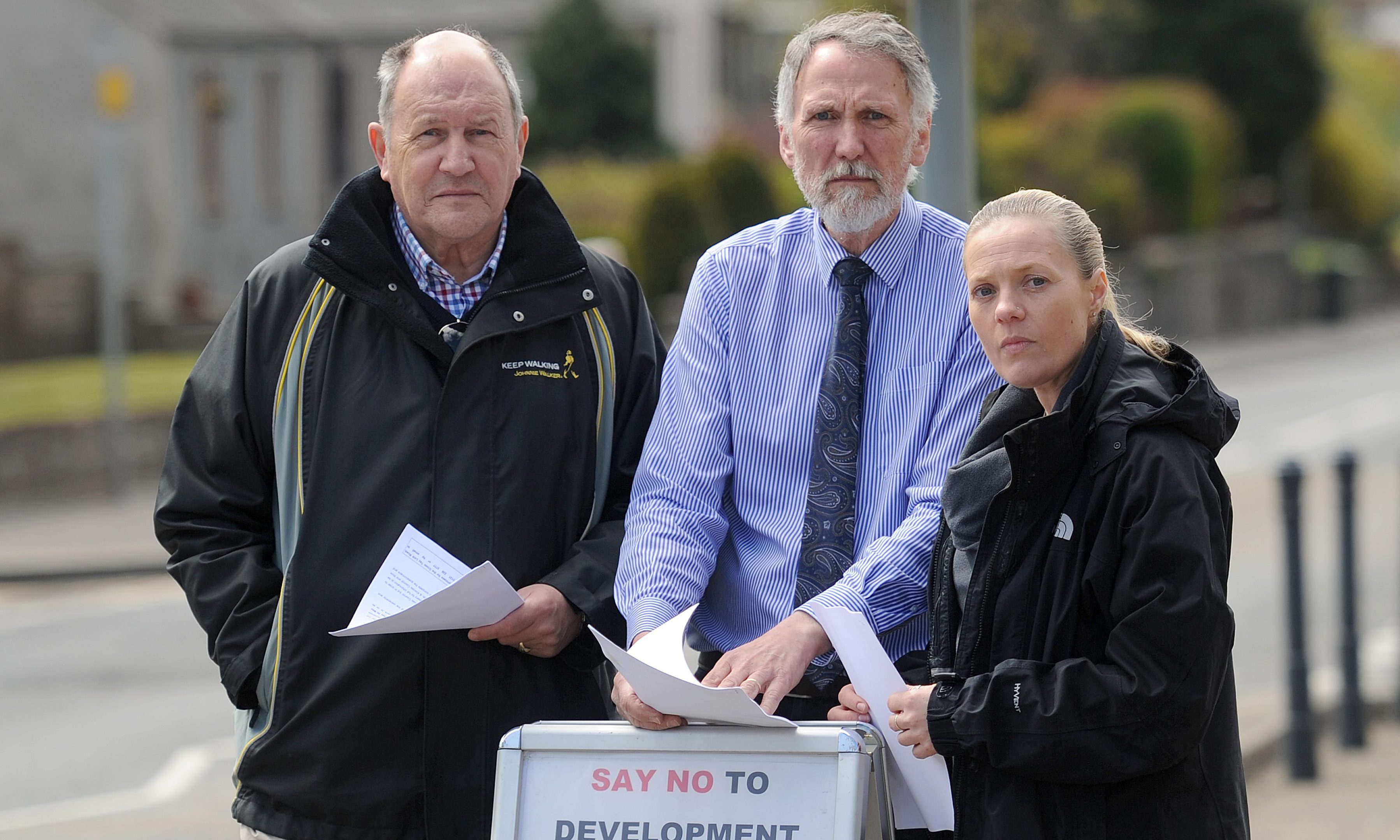 Members of Scone community council are unhappy that PKC is conducting a questionnaire about the proposed Cross Tay Link Road. Picture shows l to r - Martin Rhodes (Scone Community Council), Councillor Lewis Simpson and Lisa Cardno, Perth Road, Scone.