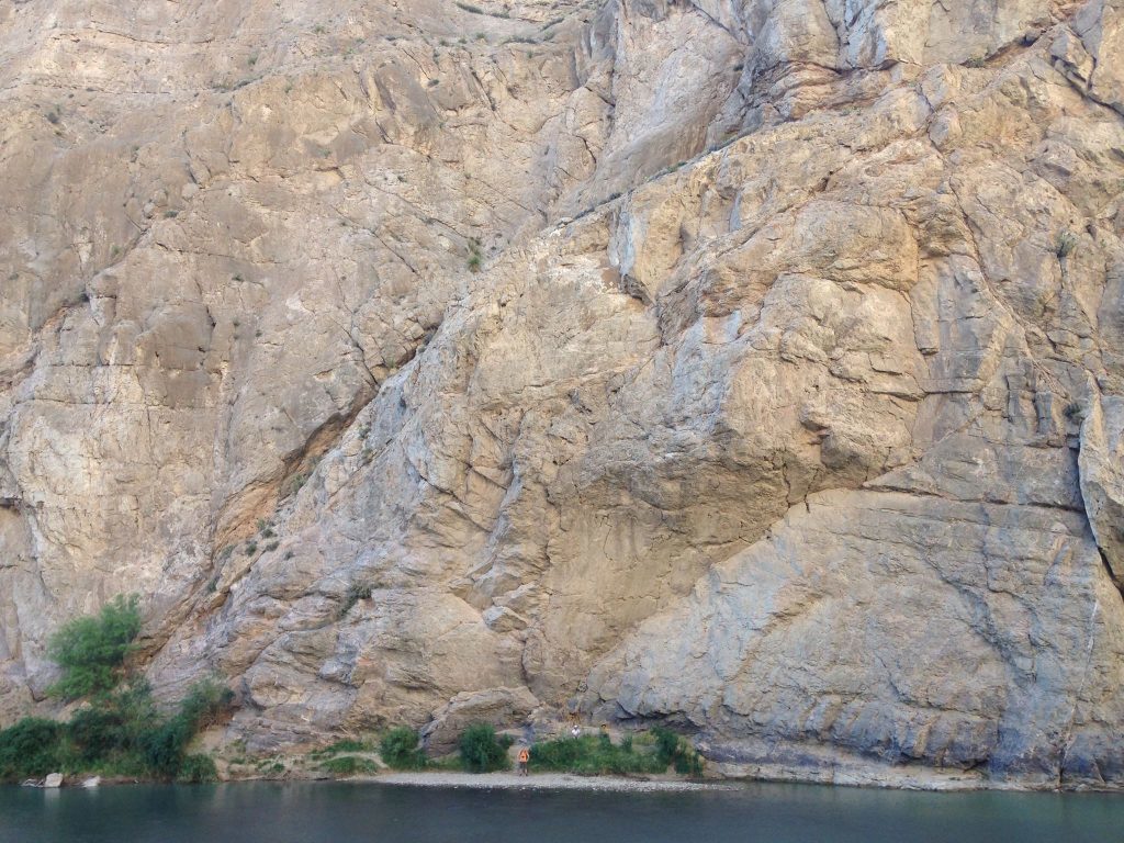 Look closely and Michael Alexander can be spotted as a tiny orange speck on the US side of a canyon carved out by the Rio Grande river further down stream