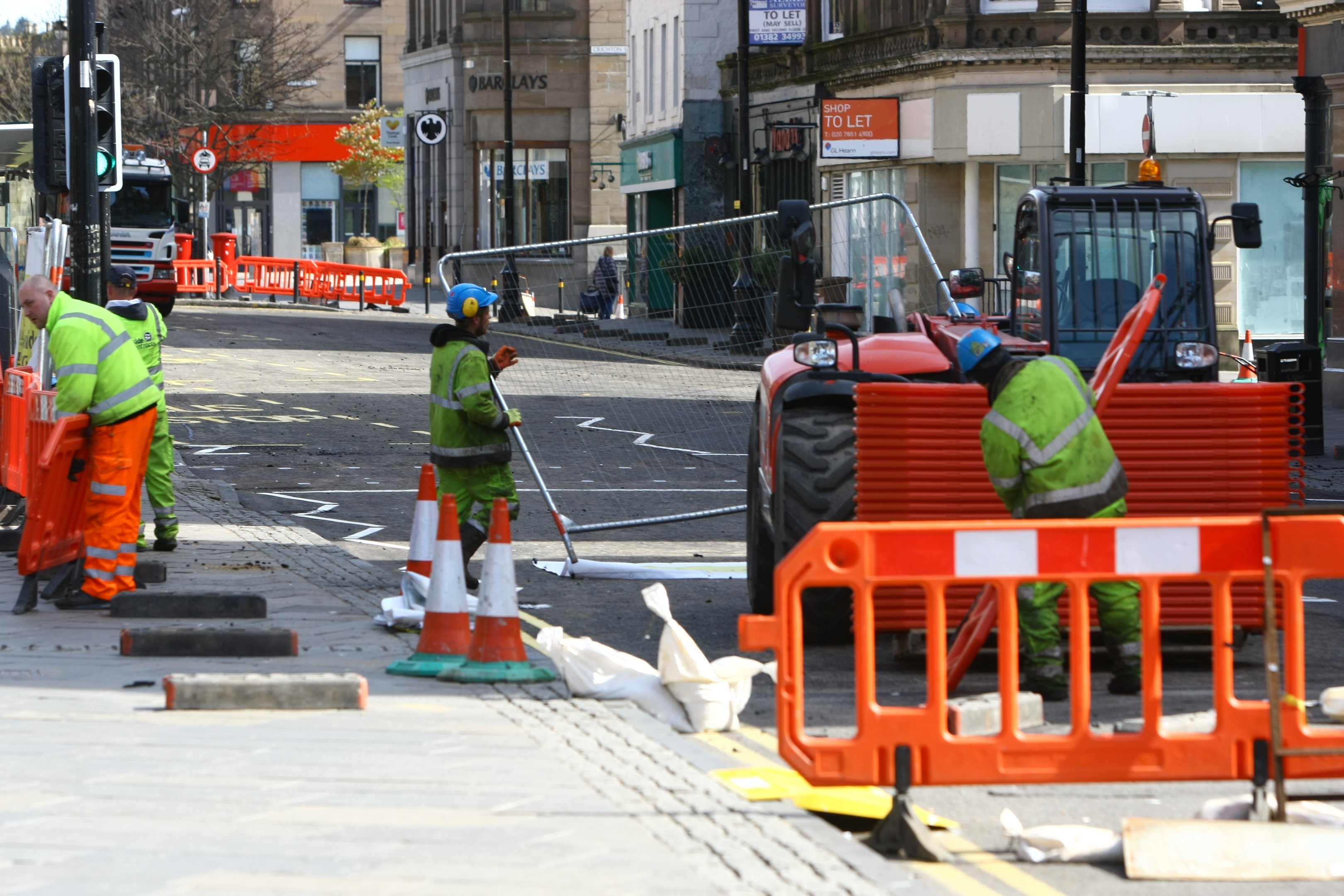 Final clear-up at the site of the roadworks.