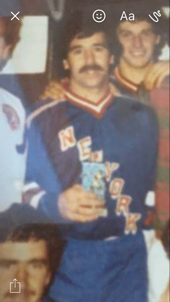 Joe Guilcher (centre) with his blue top, which was later modified to have Dundee Rockets printed over the New York slogan. 