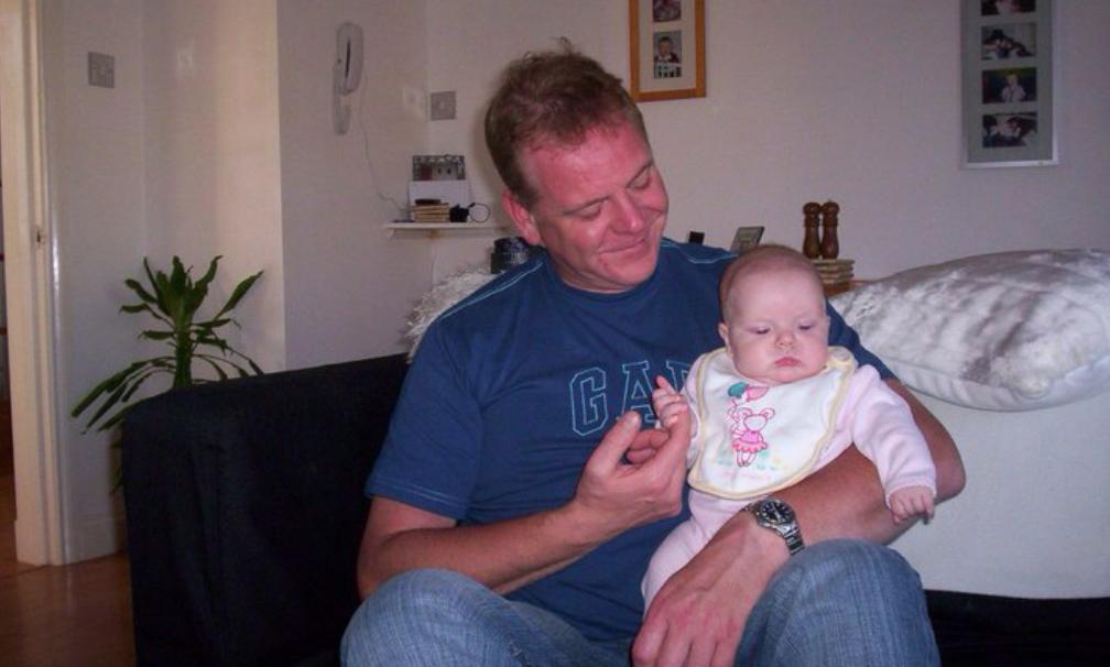 Stuart Beharrie with his granddaughter, Ellie, who he hopes to take to Disneyland Paris.