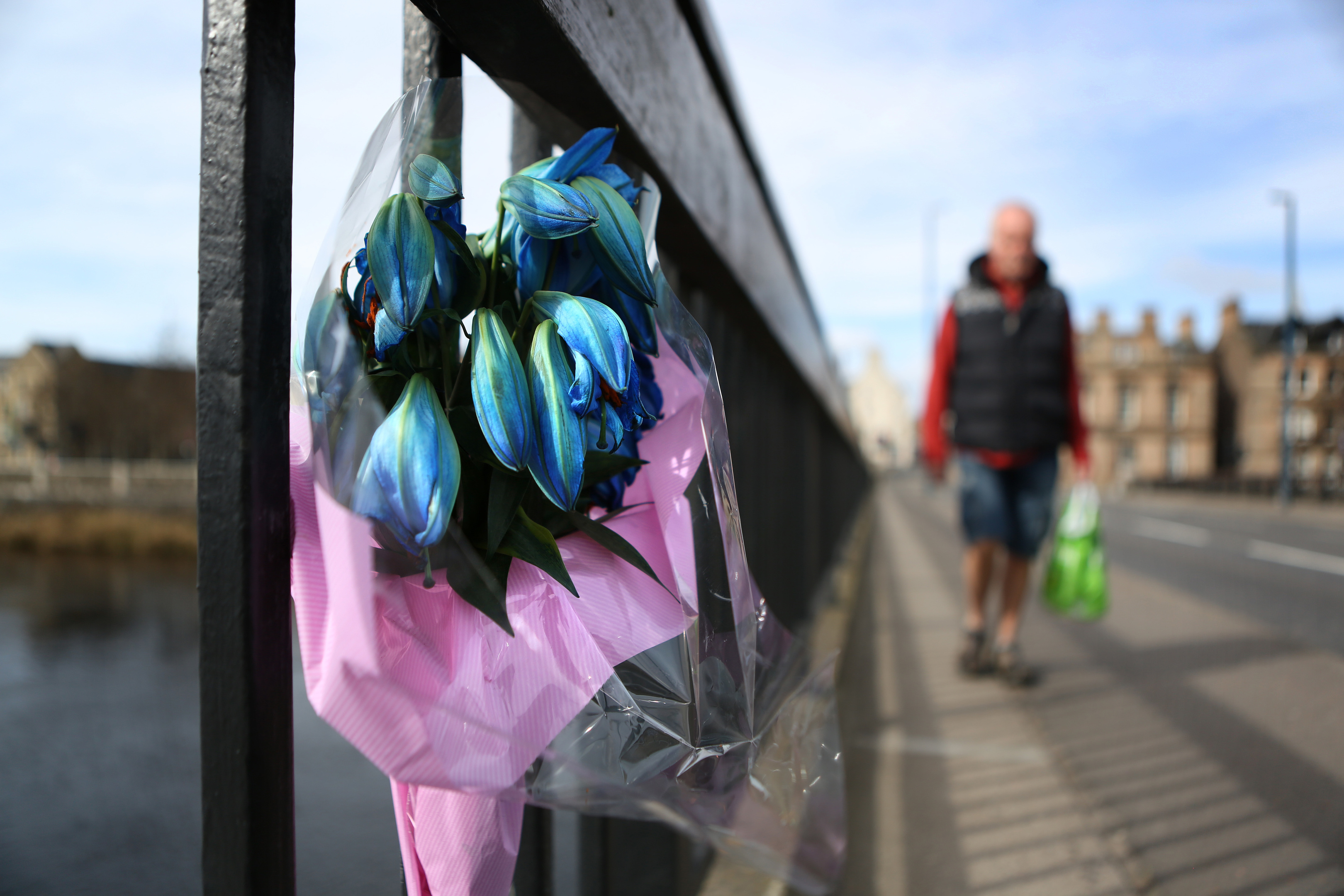 A floral tribute was left on  Perth's, Queen's bridge with a note to Kieran.