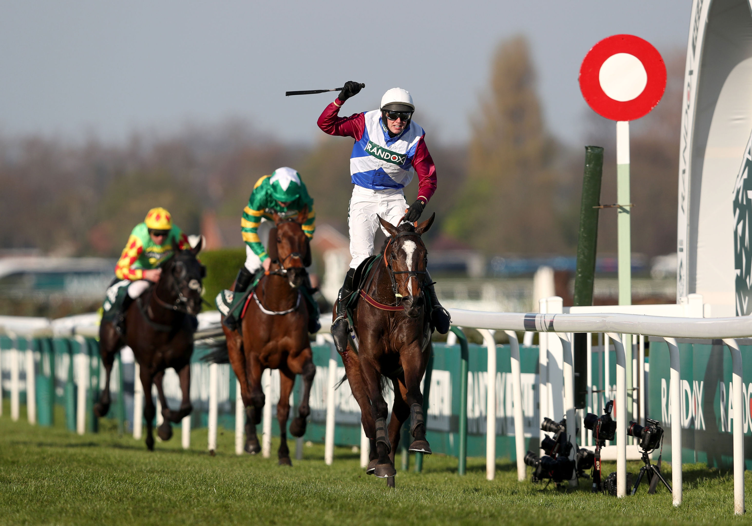 One For Arthur ridden by Derek Fox crosses the line to win the Grand National.