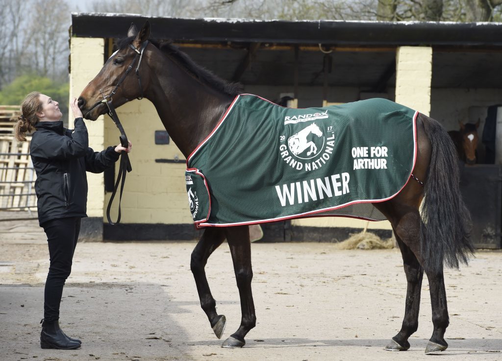 Grand National winner One For Arthur is paraded by stable girl Jaimie Duff.