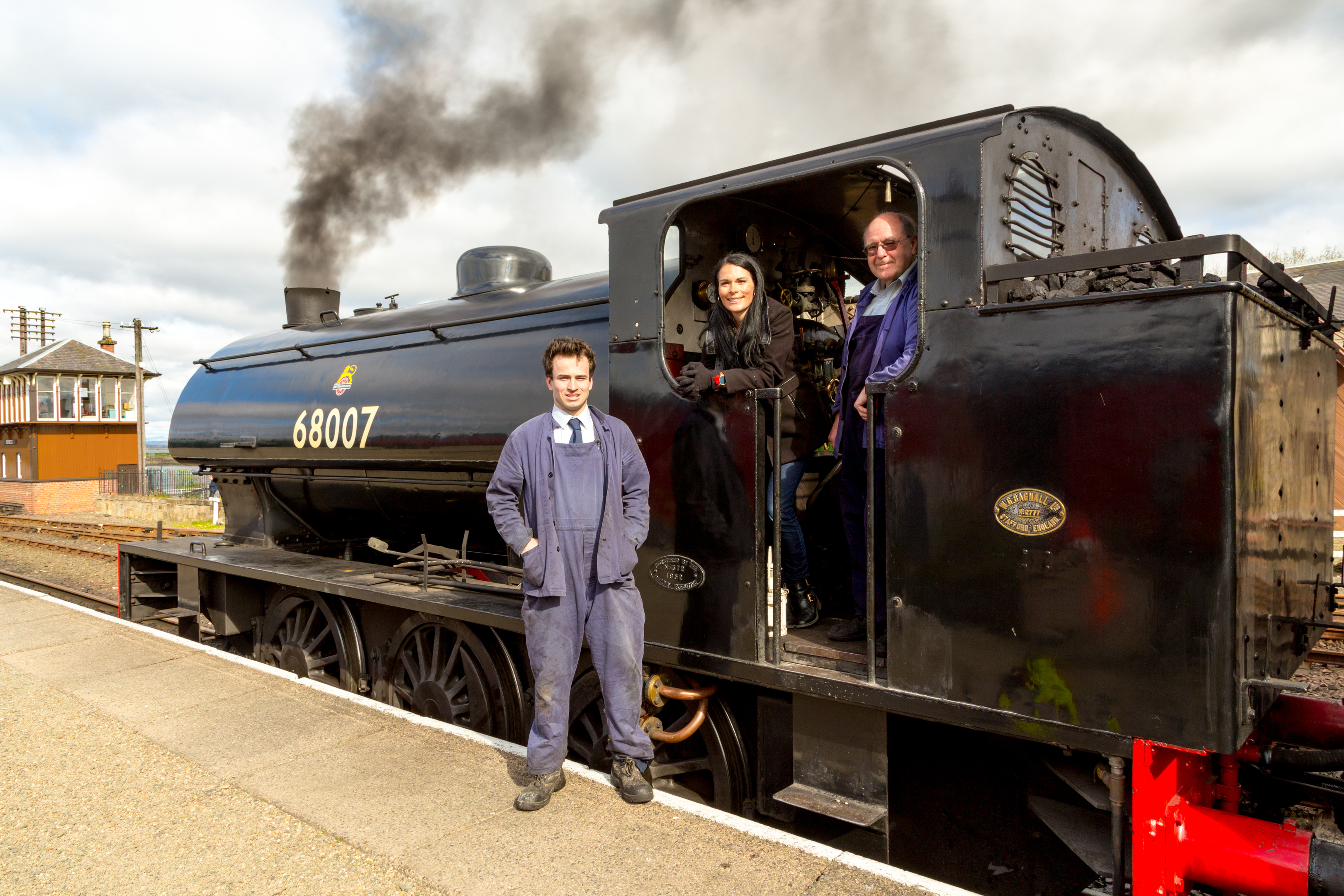 Gayle with fireman Andrew Fowler and train driver Dave McLaren.