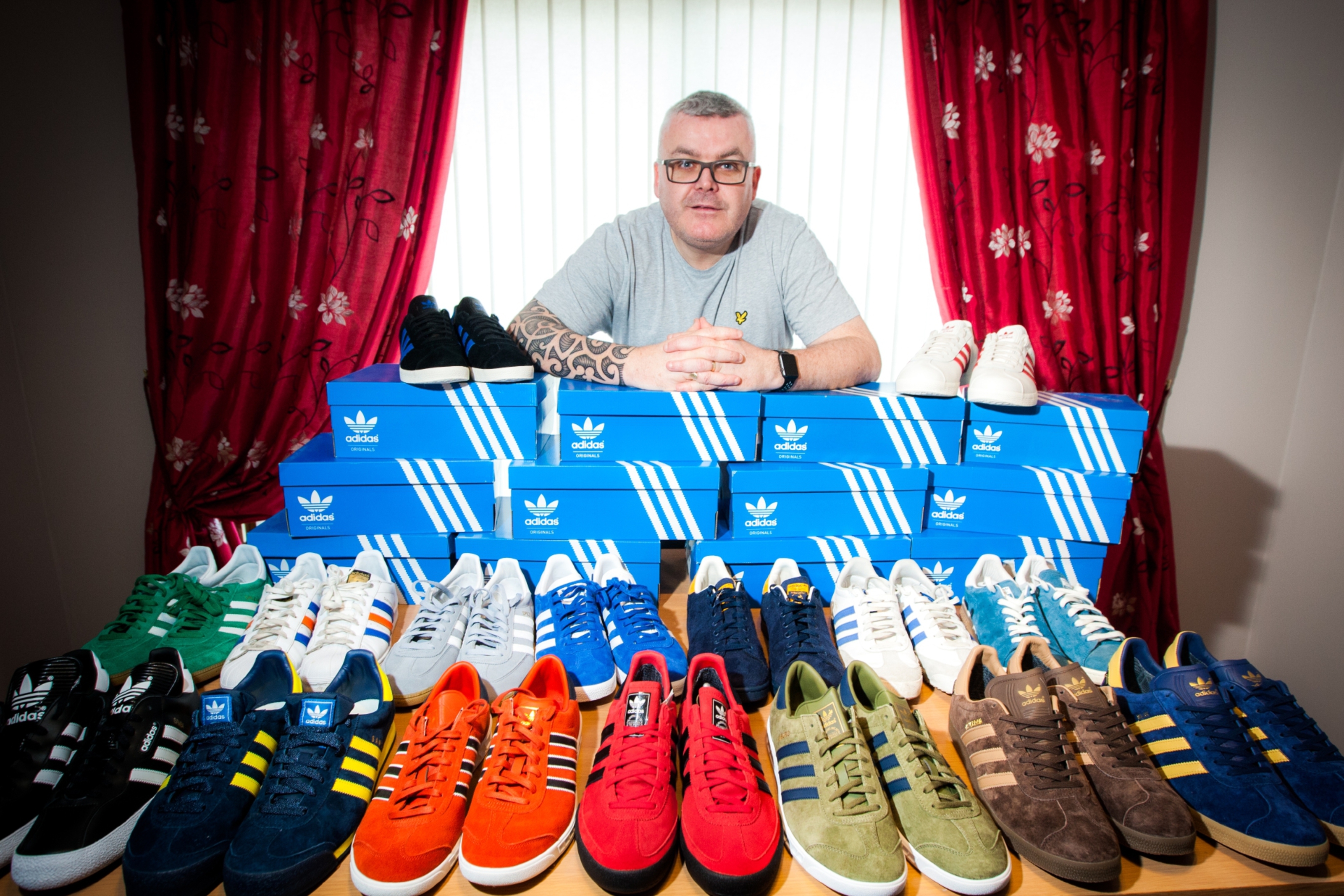 Alan Stewart with a small selection of his Adidas trainer collection.