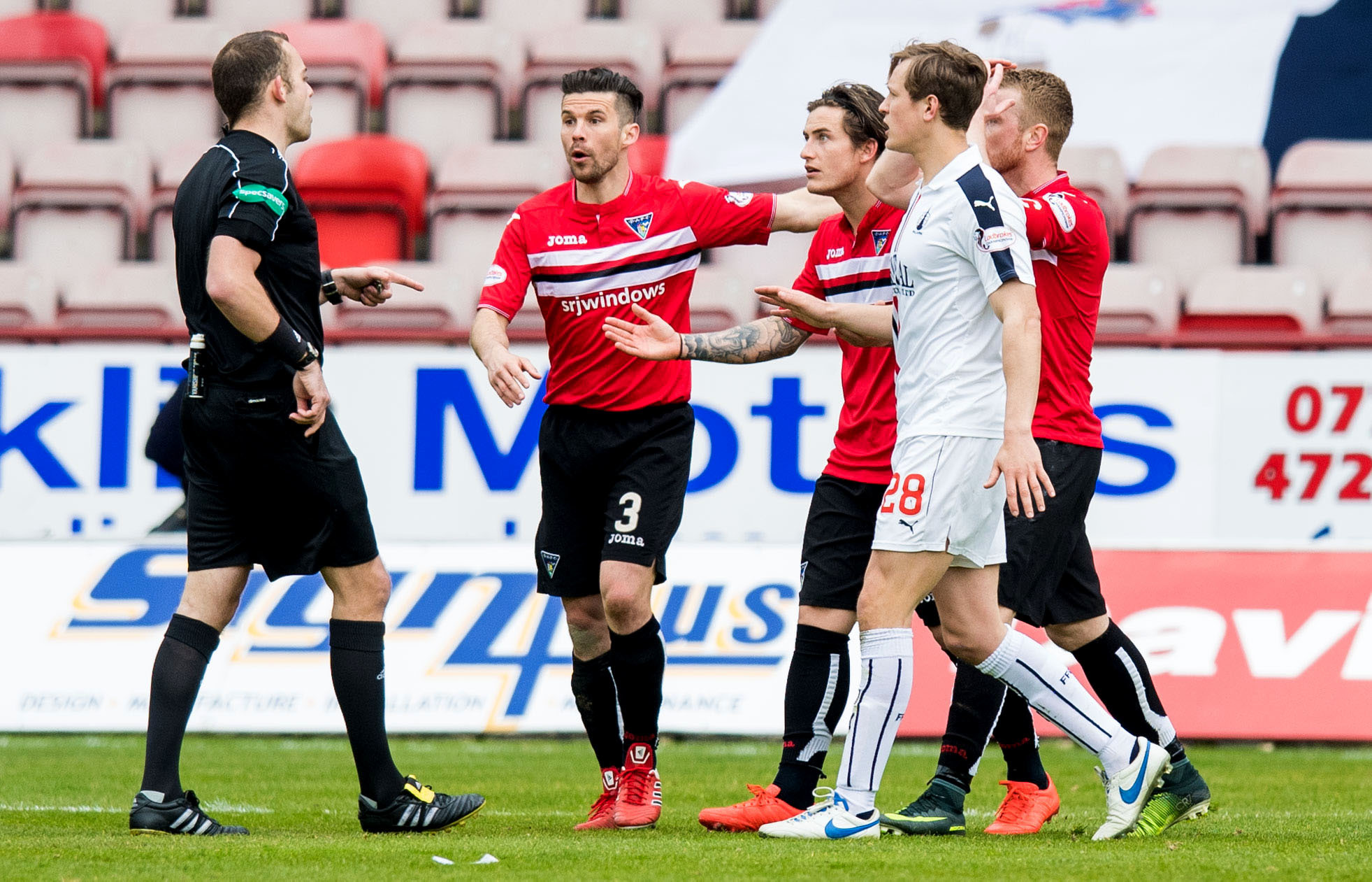 Dunfermline players contest a decision in their match with Falkirk. The game has now proved controversial off the field as well.