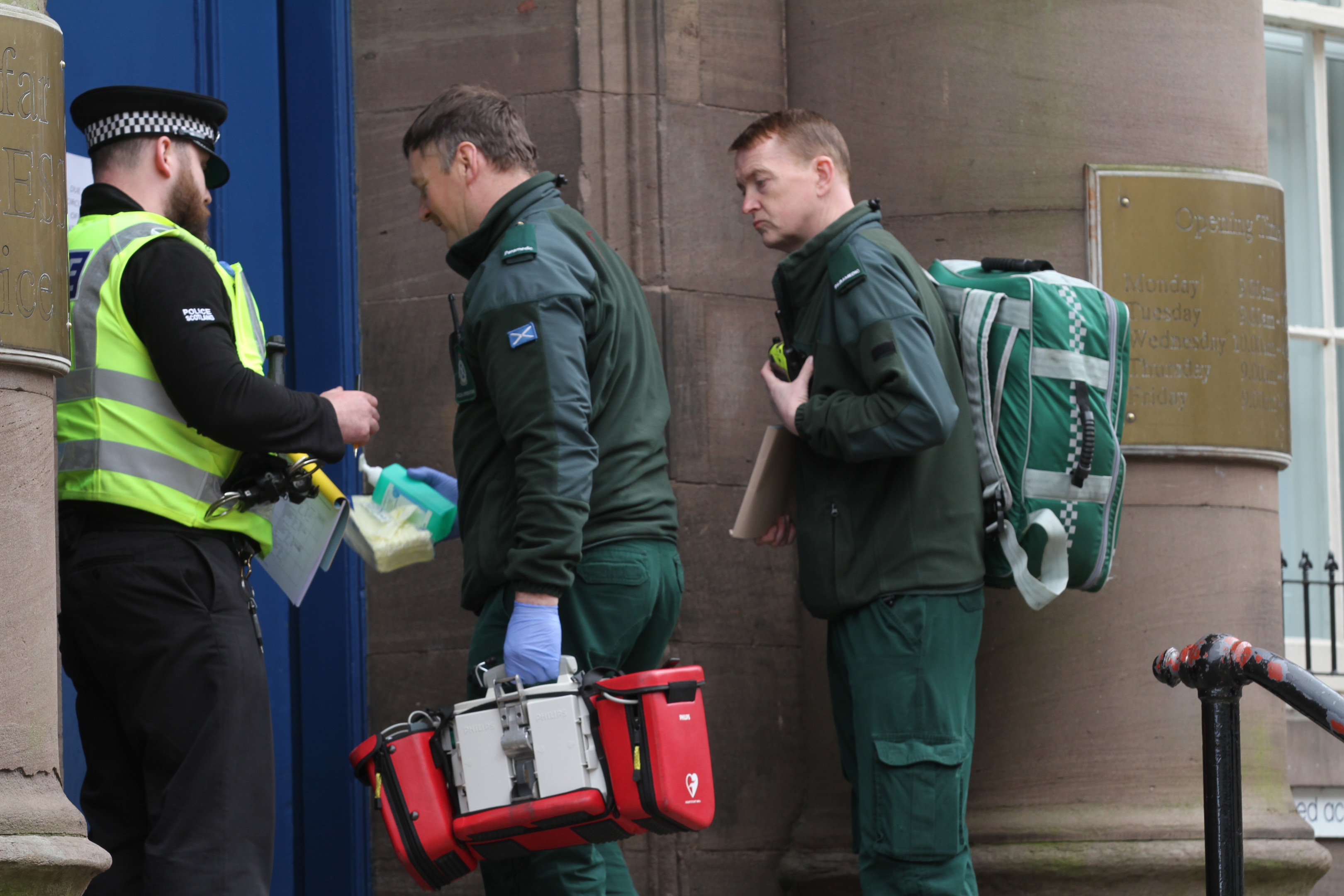 Paramedics entering the Municipal Buildings in Forfar on Wednesday afternoon.