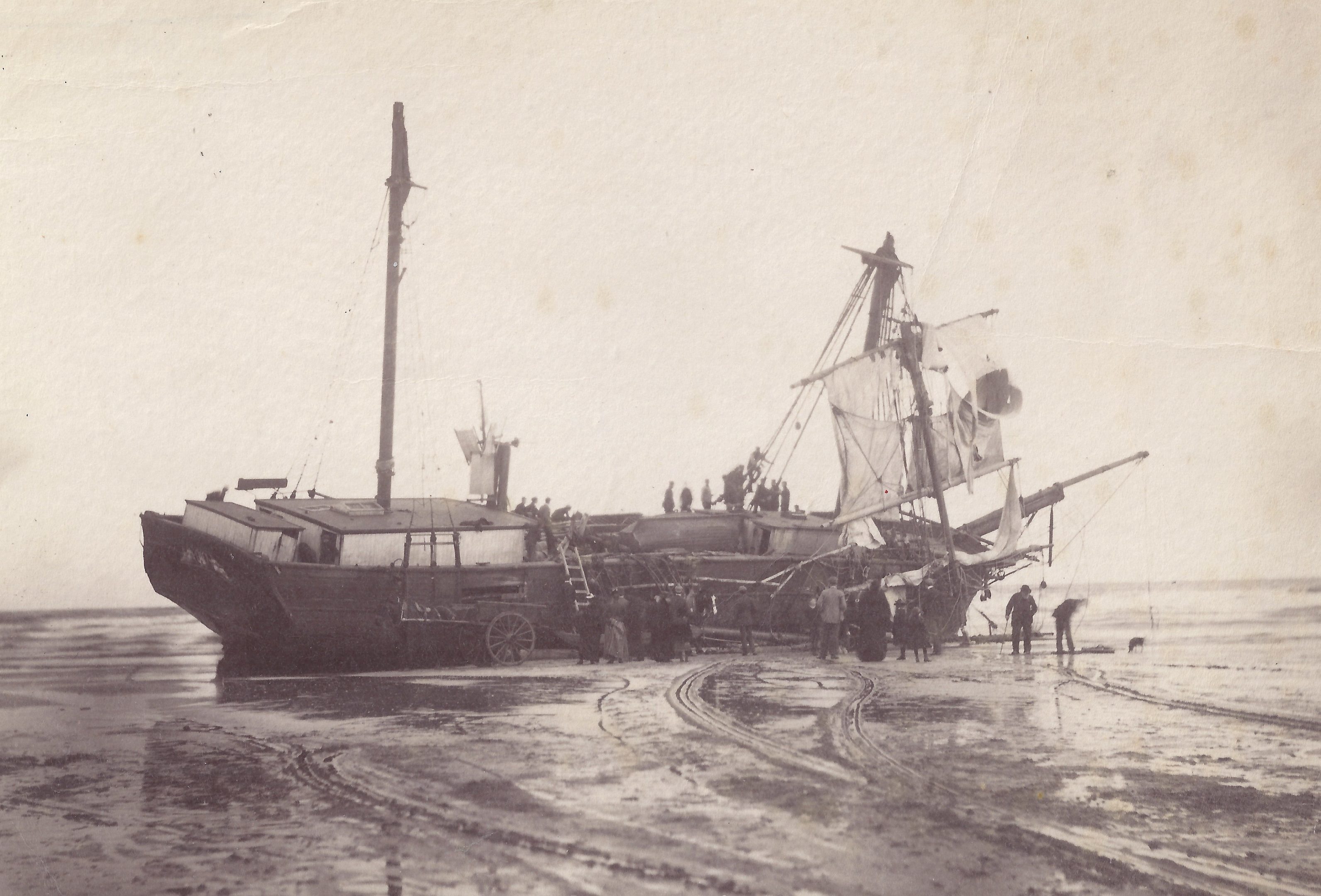 The wreck of the Wilhelm of Riga. Carrying coal from Boston to Memel she was driven ashore on the West Sands, St Andrews, in October 1898.