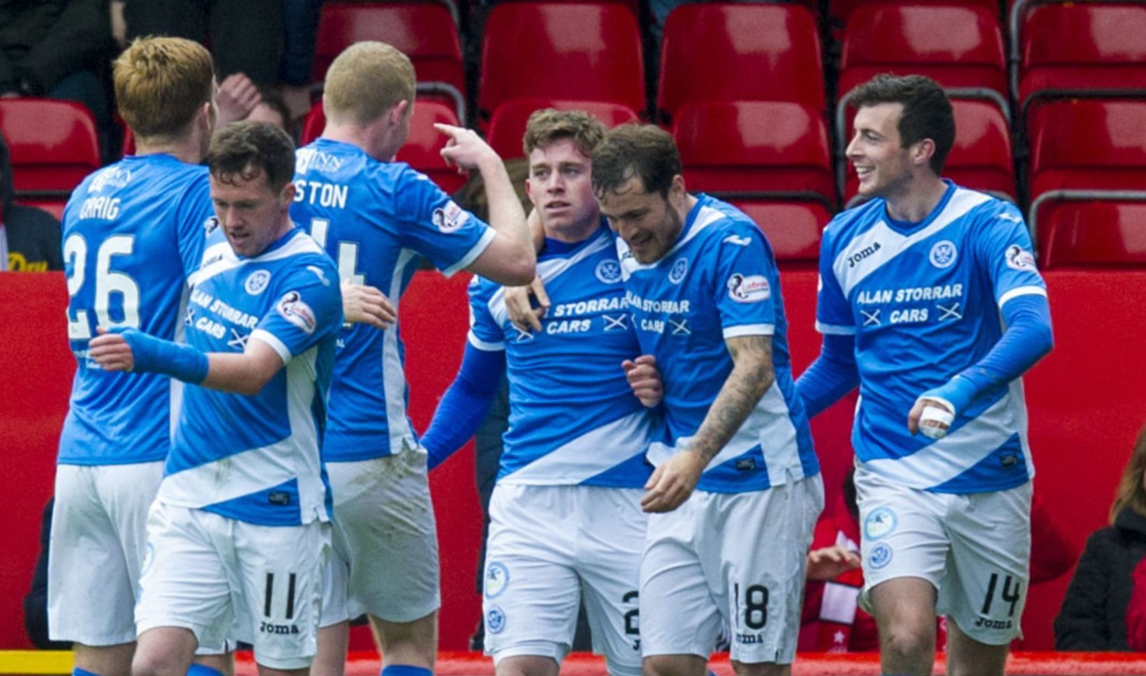 Craig Thomson, centre, is congratulated by his teammates.