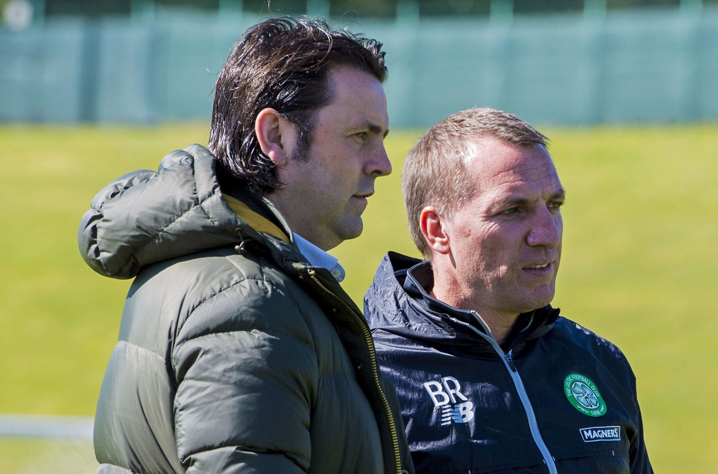 Ex-Dundee manager Paul Hartley speaks with Celtic manager Brendan Rodgers at Lennoxtown.