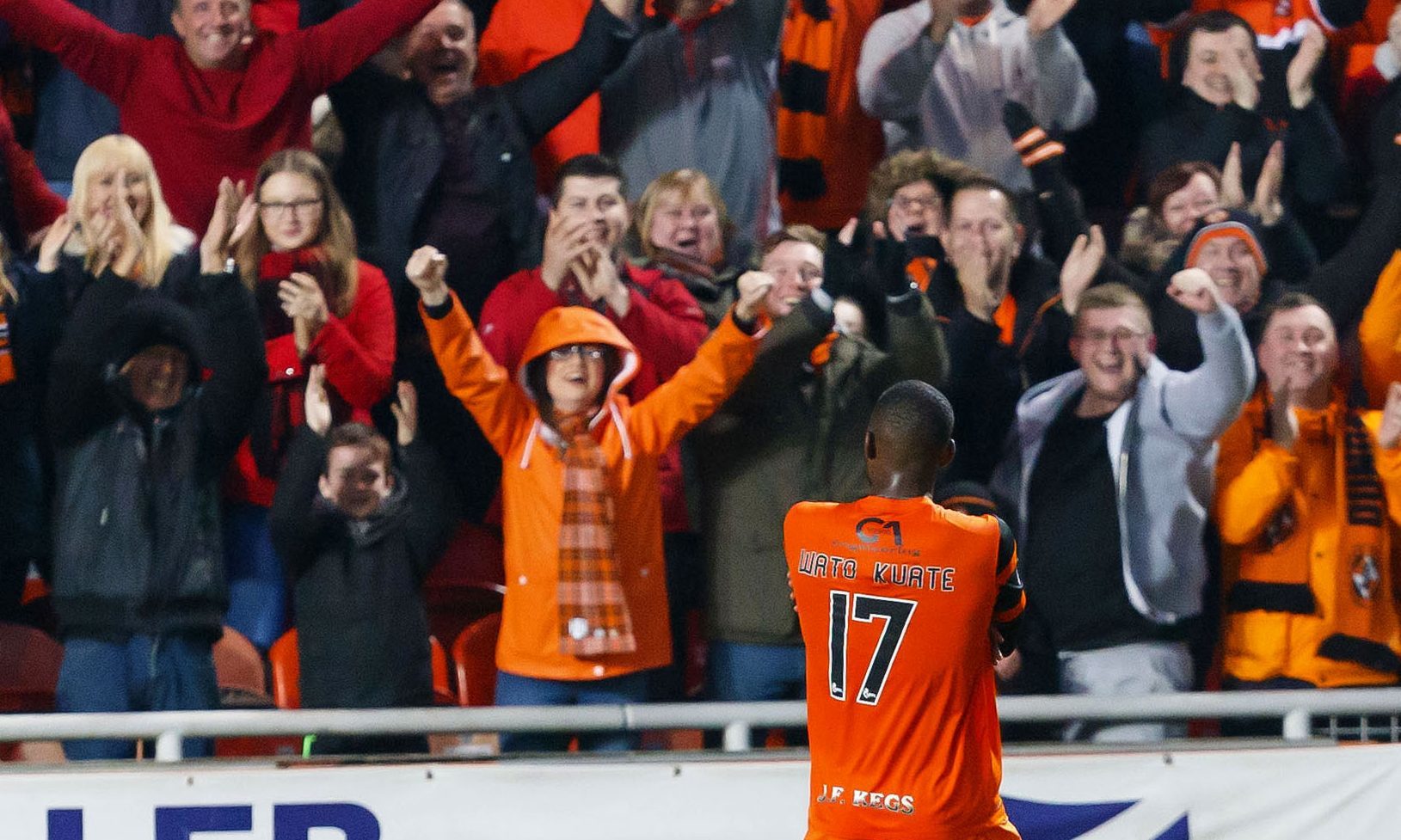 Wato Kuate celebrates his goal with the fans.