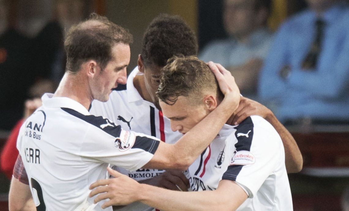 Marr Kerr congratulates Falkirk scorer Joe McKee.