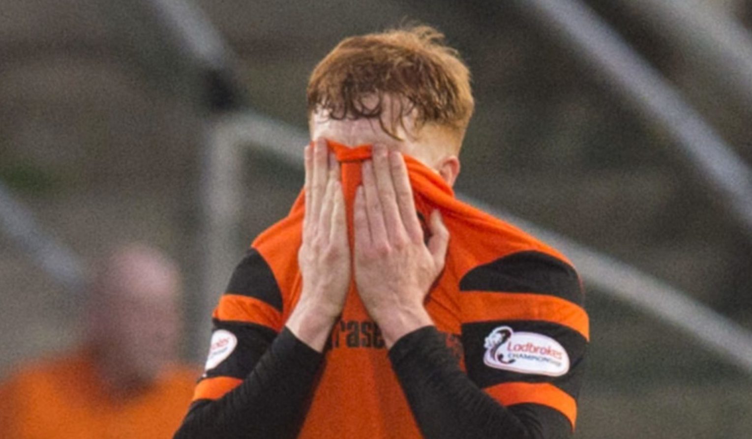 Simon Murray is distraught after red card.