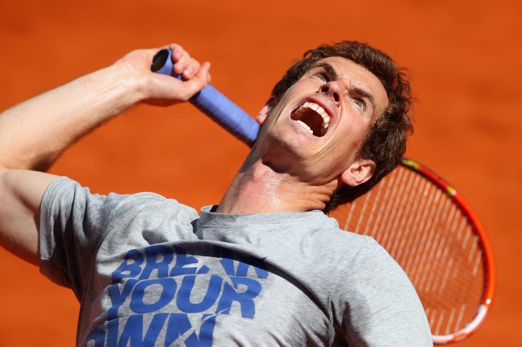 Andy Murray serves in a practice session during day one of the Mutua Madrid Open tennis tournament at the Caja Magica on May 3, 2014 in Madrid, Spain. 