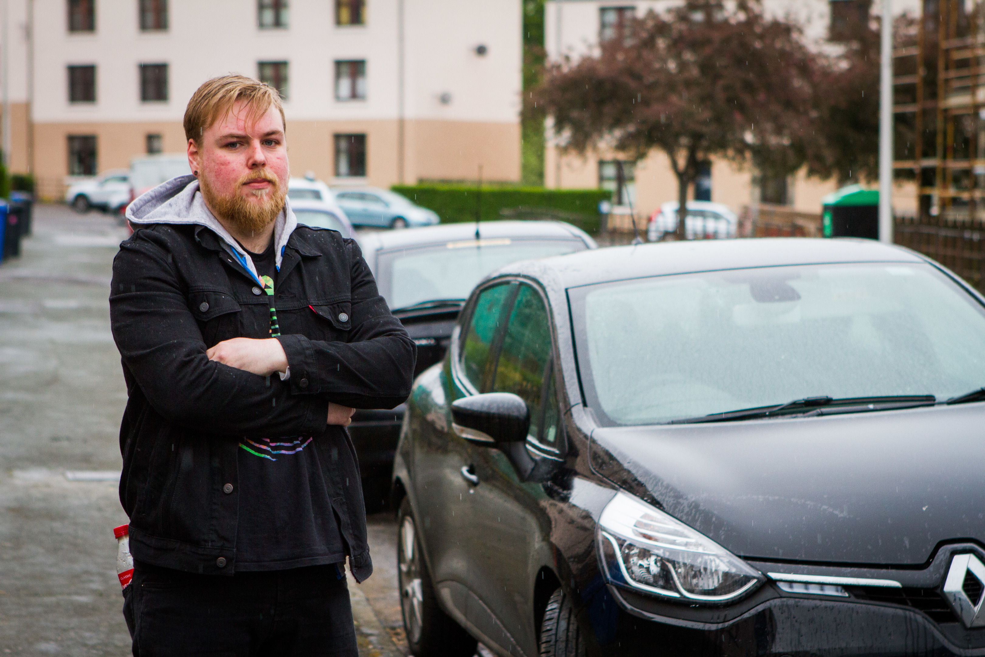 Jonathon Baillie alongside his car on Hepburn Street.