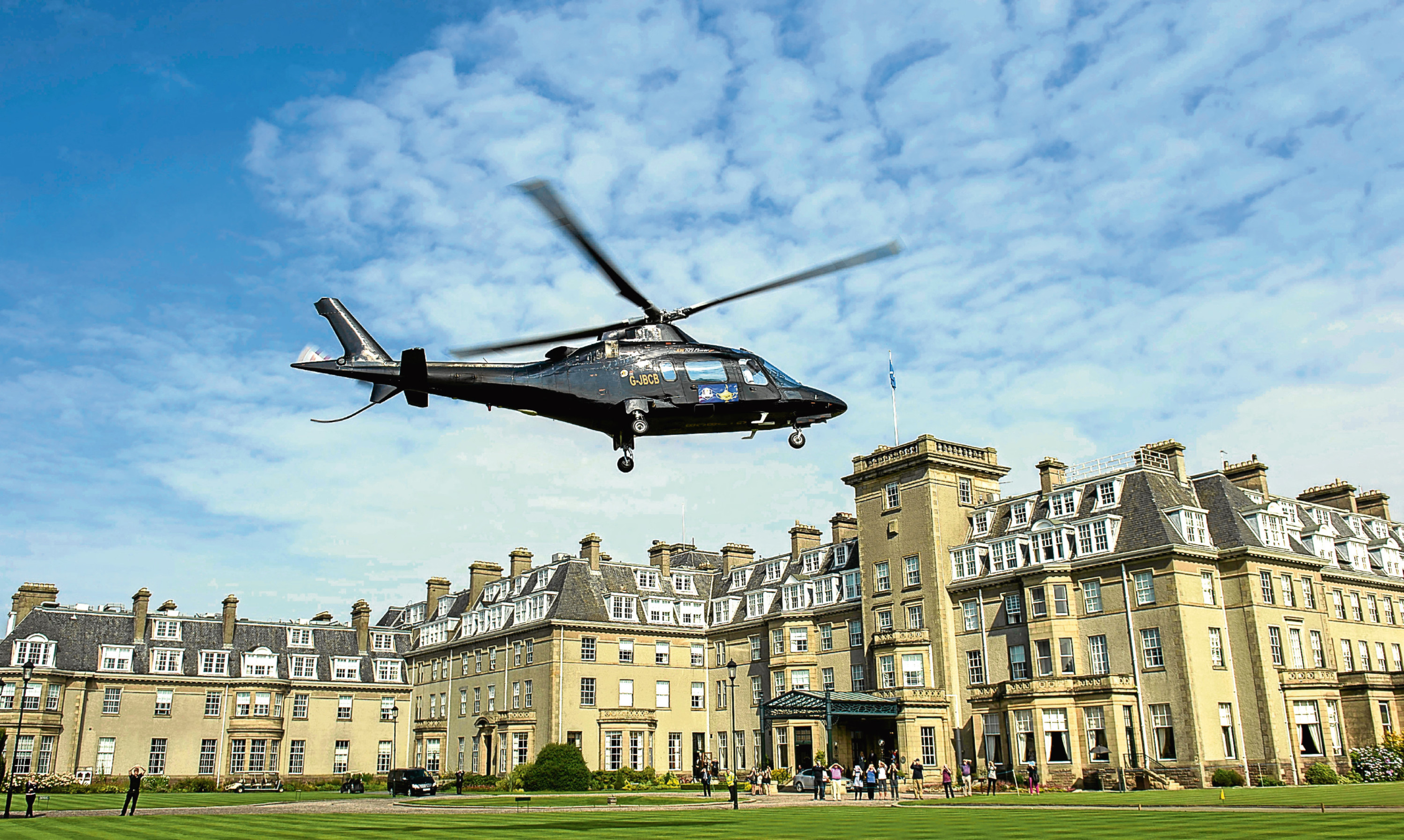 A helicopter lands at Gleneagles Hotel