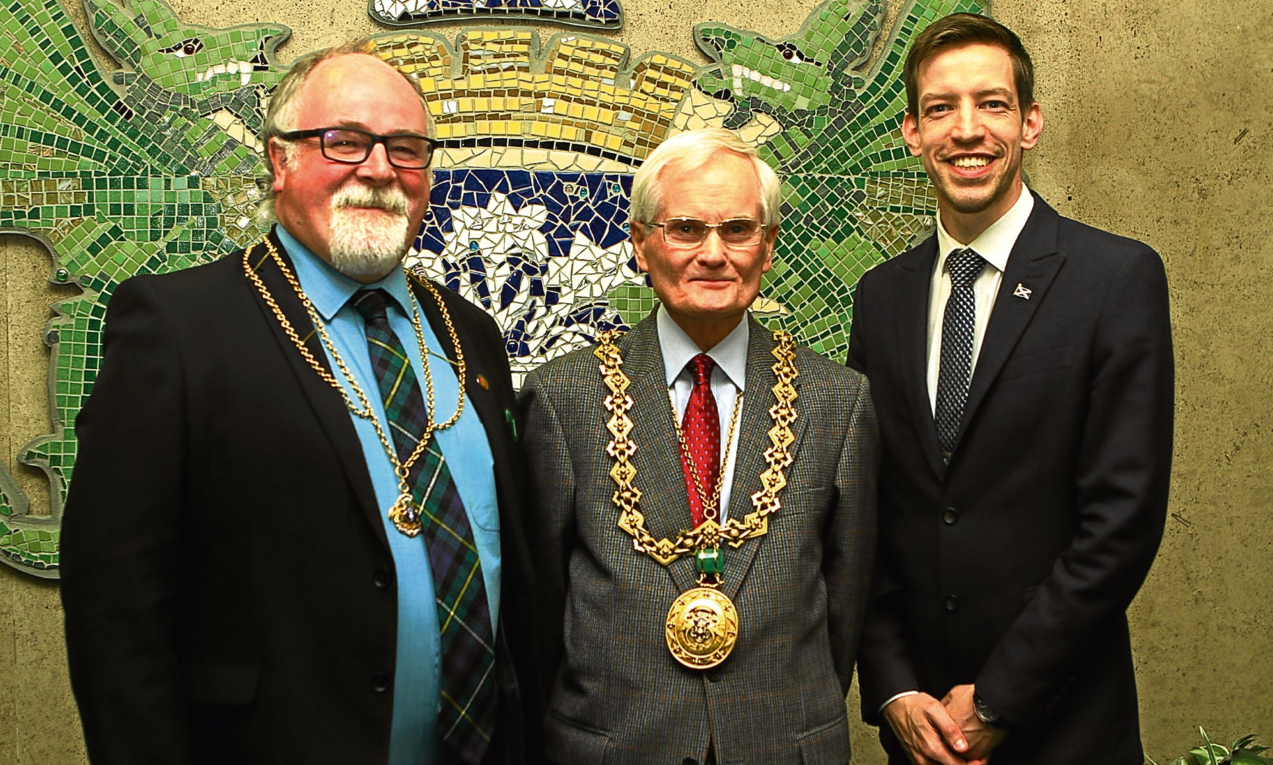 The new lord provost of Dundee Ian Borthwick, centre, with depute lord provost Bill Campbell, left, and administration leader John Alexander.