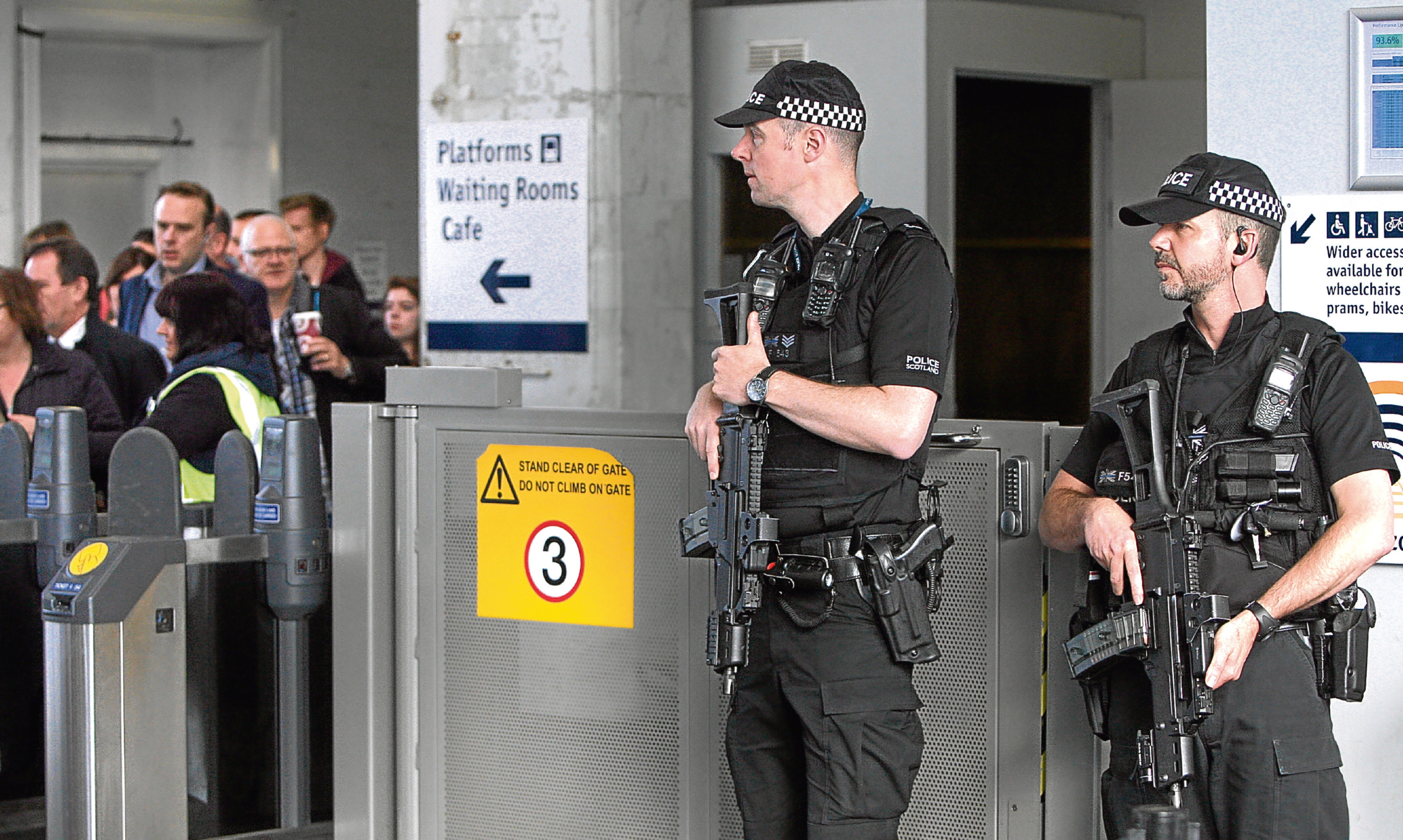 Armed police officers on duty at Dundee railway station in May following the Manchester terror attack.