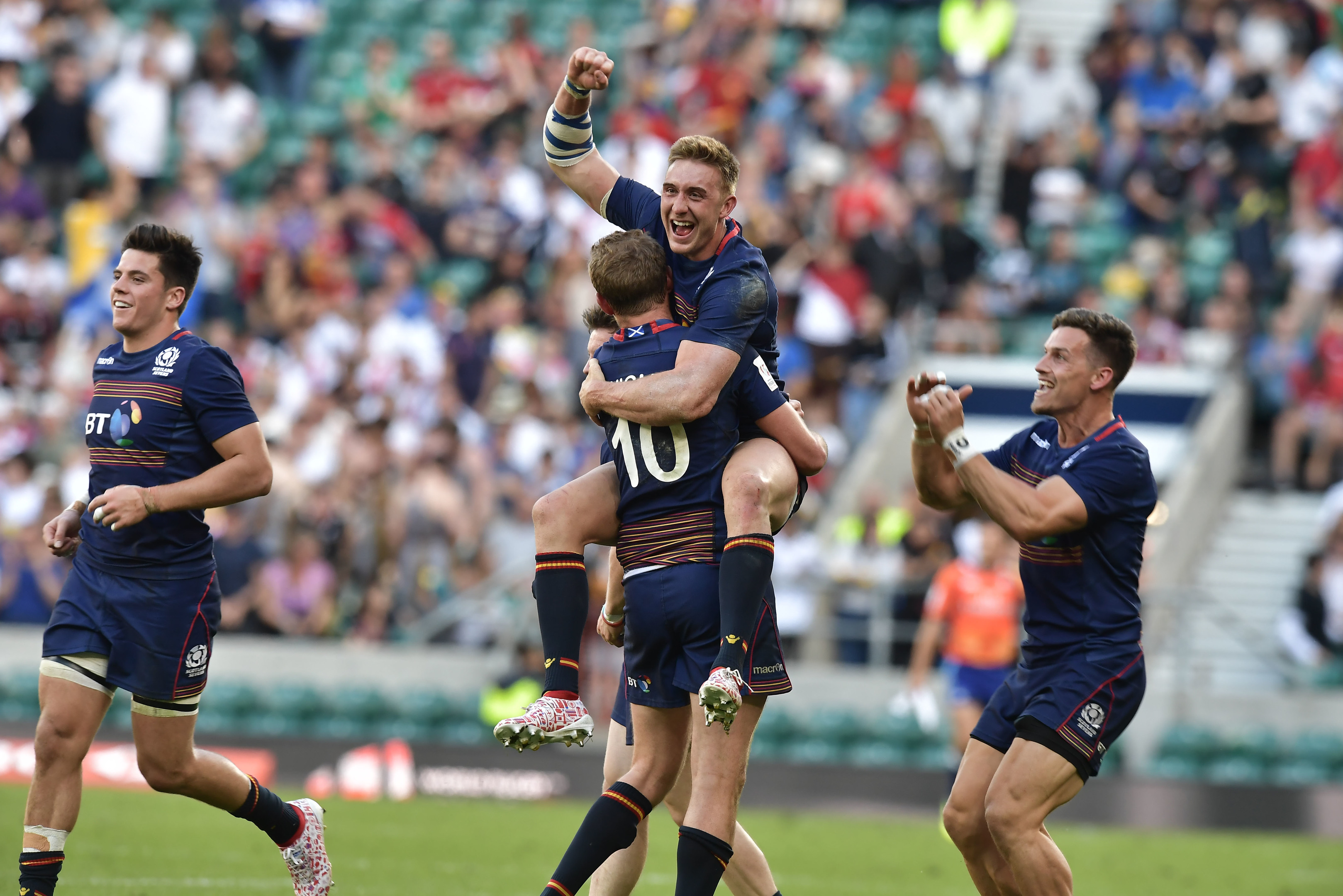 The retiring Scott Wight (10) and Dougie Fife celebrate as Scotland clinch victory in the HSBC London 7s