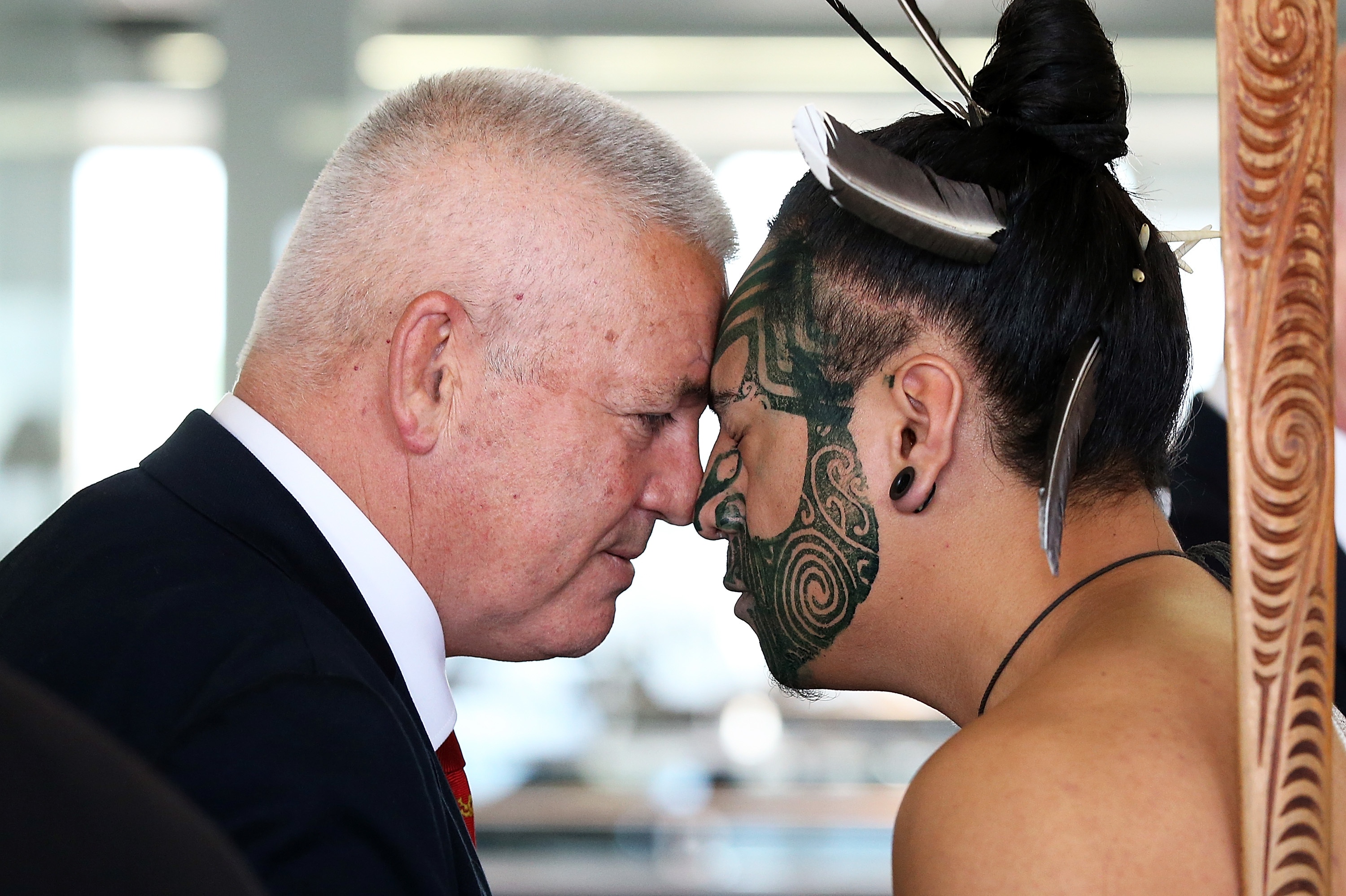 Coach Warrren Gatland receives a hongi in welcome as the team arrives at Auckland International Airport.