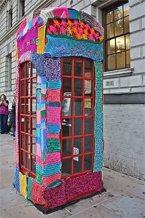 A striking knitted and crocheted cover keeps this kiosk cosy.