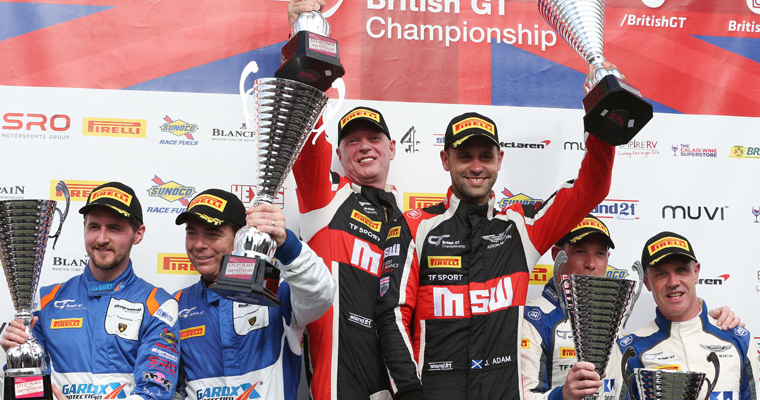 Derek Johnston (left) and record-breaking Jonny Adam celebrate race two victory