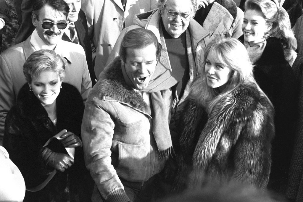 Fiona Fullerton, Sir Roger Moore and Tanya Roberts at the re-opening of the world's largest film stage at Pinewood Studios in 1985, after it was destroyed by a fire.